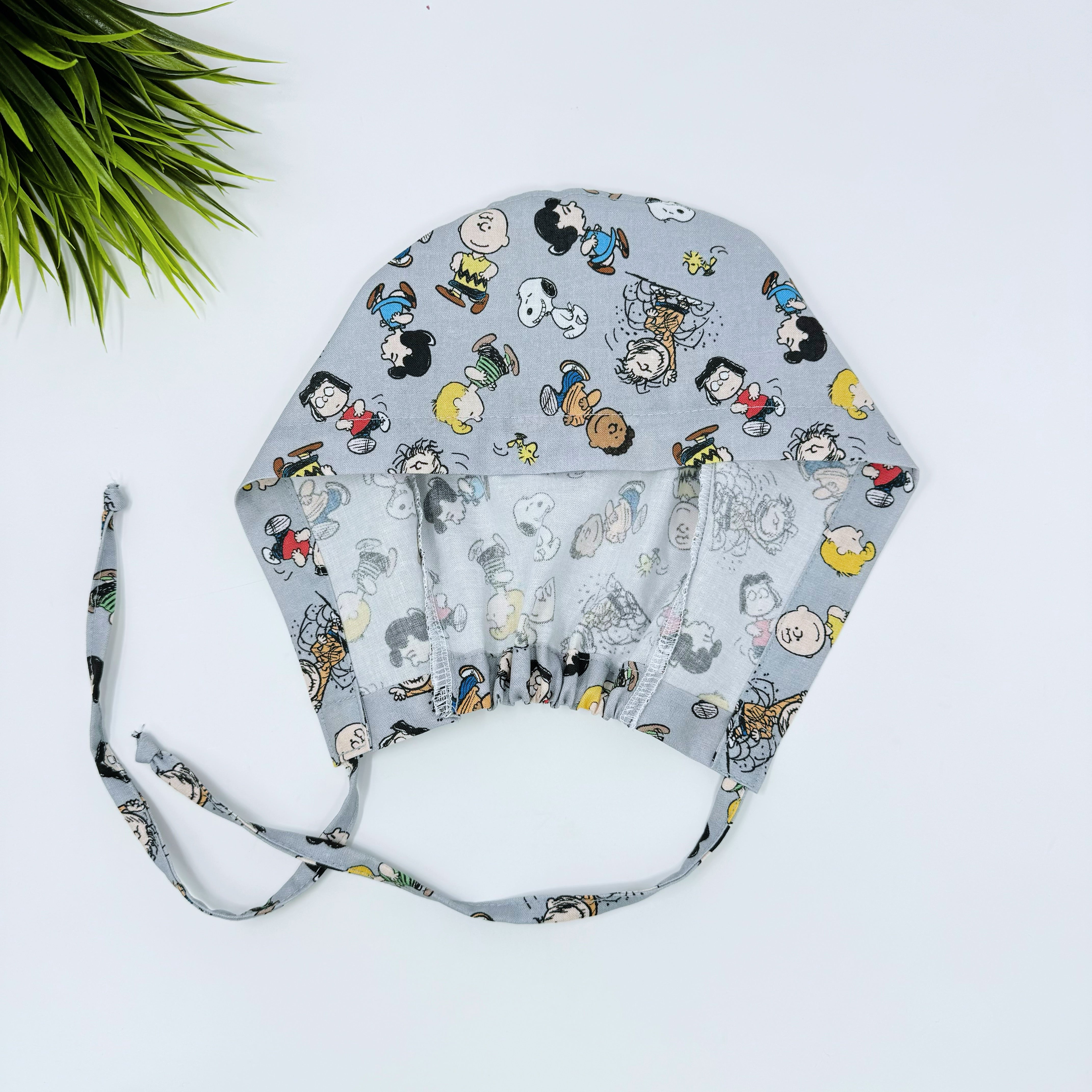 Peanuts Skull tie-back style surgical scrub cap for men by Paradise Caps.