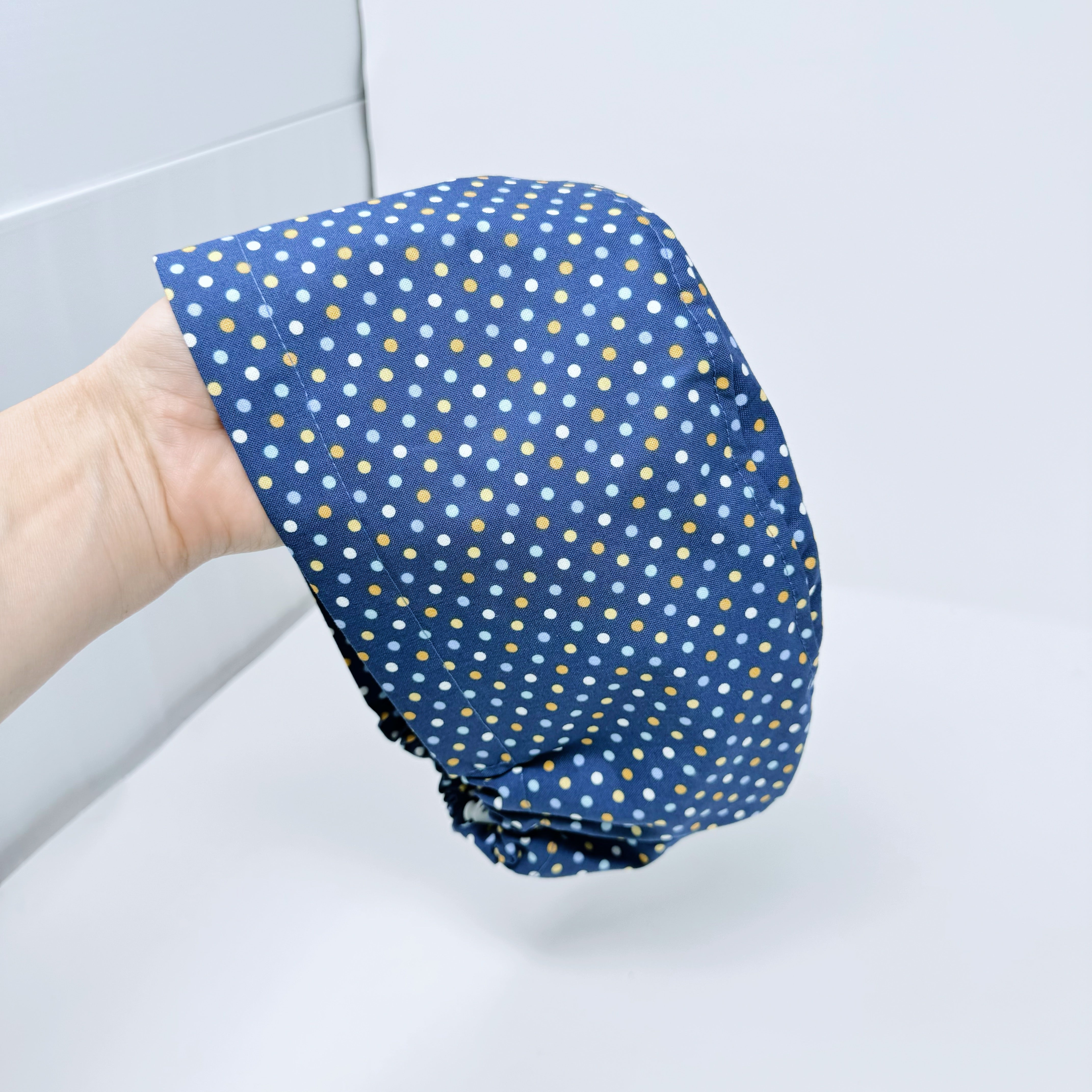 Navy Polka Dot Euro Scrub Cap for Women with Satin Lined Option by Paradise Caps.