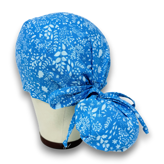 Calm Blue Ponytail scrub cap for women with satin lined option by Paradise Caps.