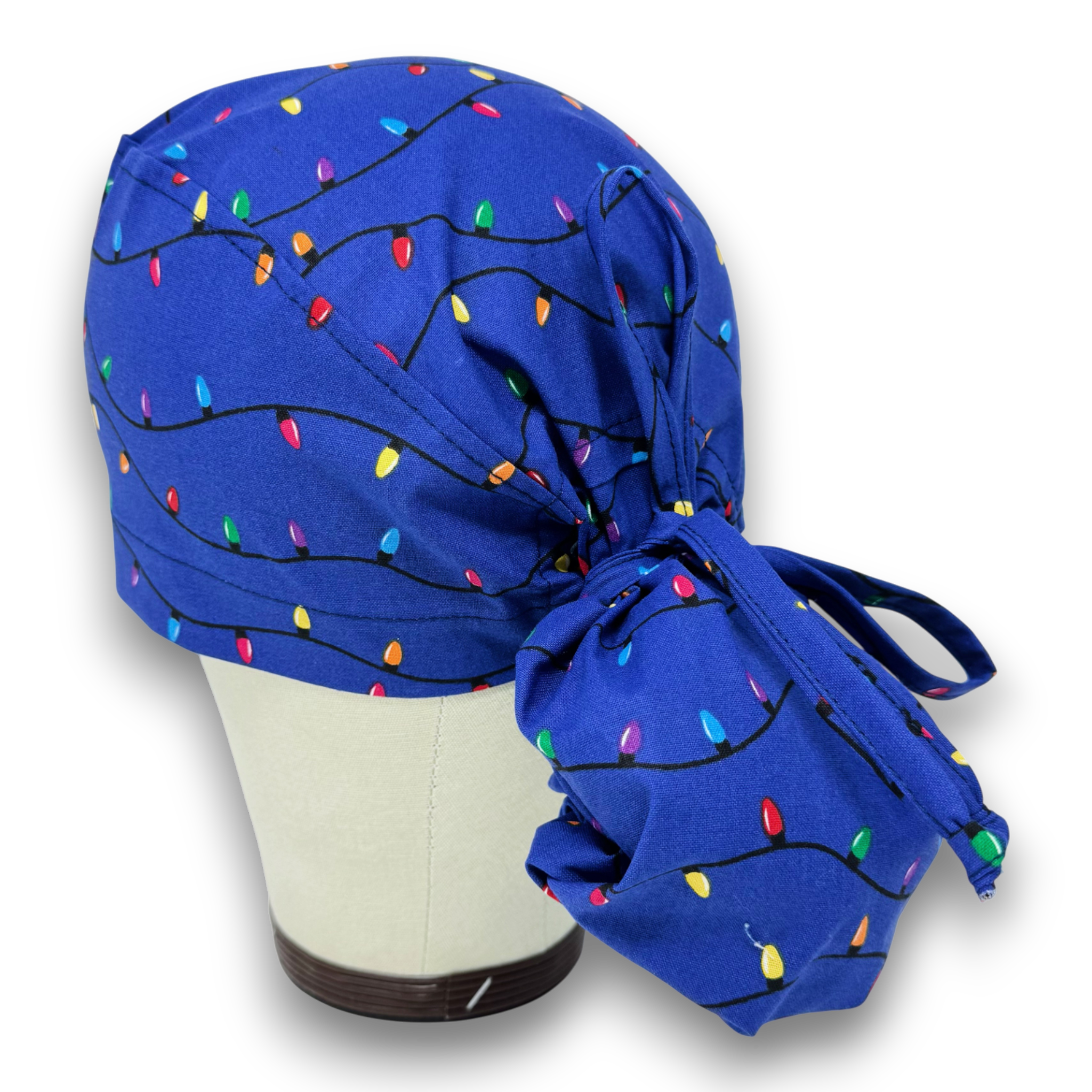 Christmas Lights Ponytail scrub cap for women with satin lined option by Paradise Caps.