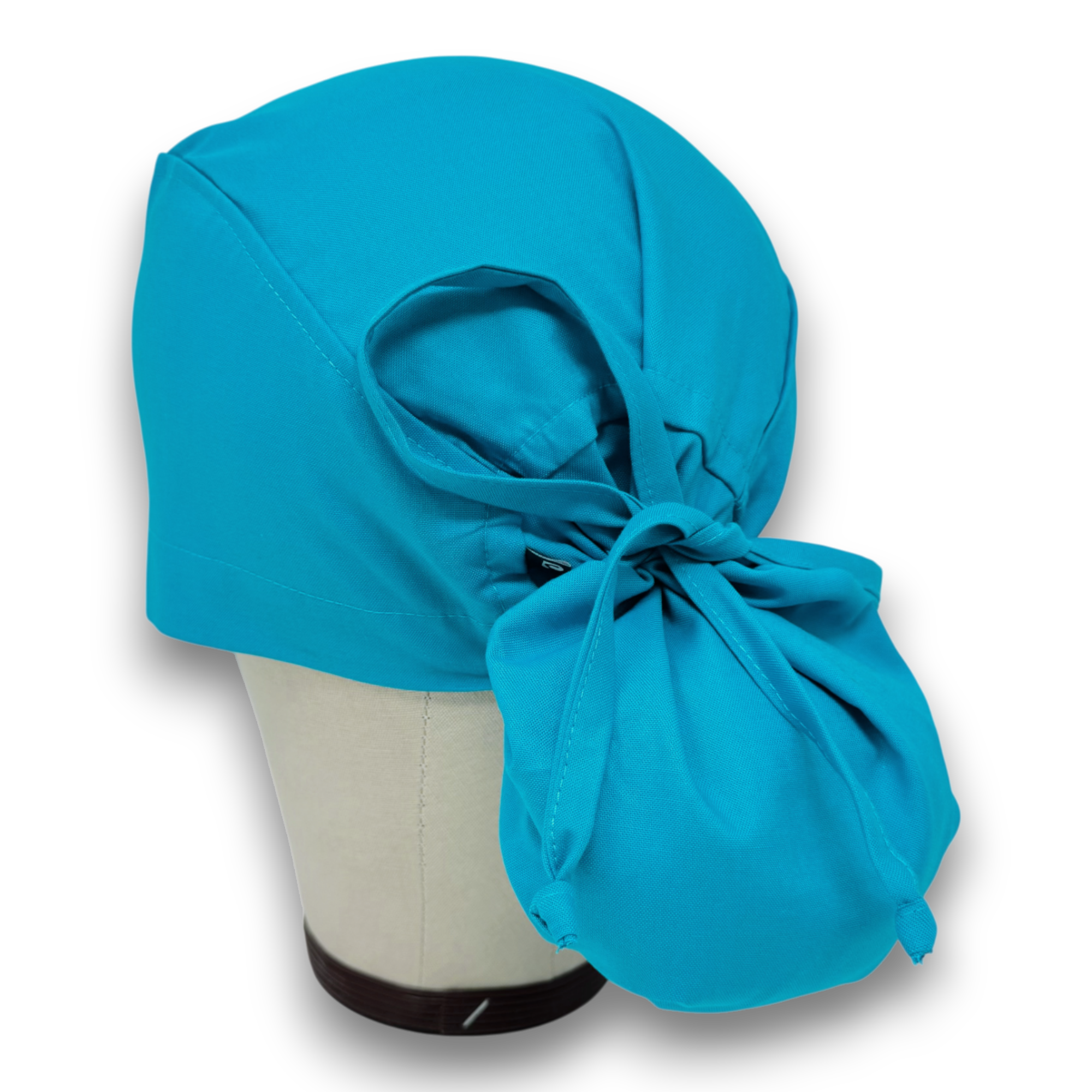 Solid blue Ponytail scrub cap for women with satin lined option by Paradise Caps.