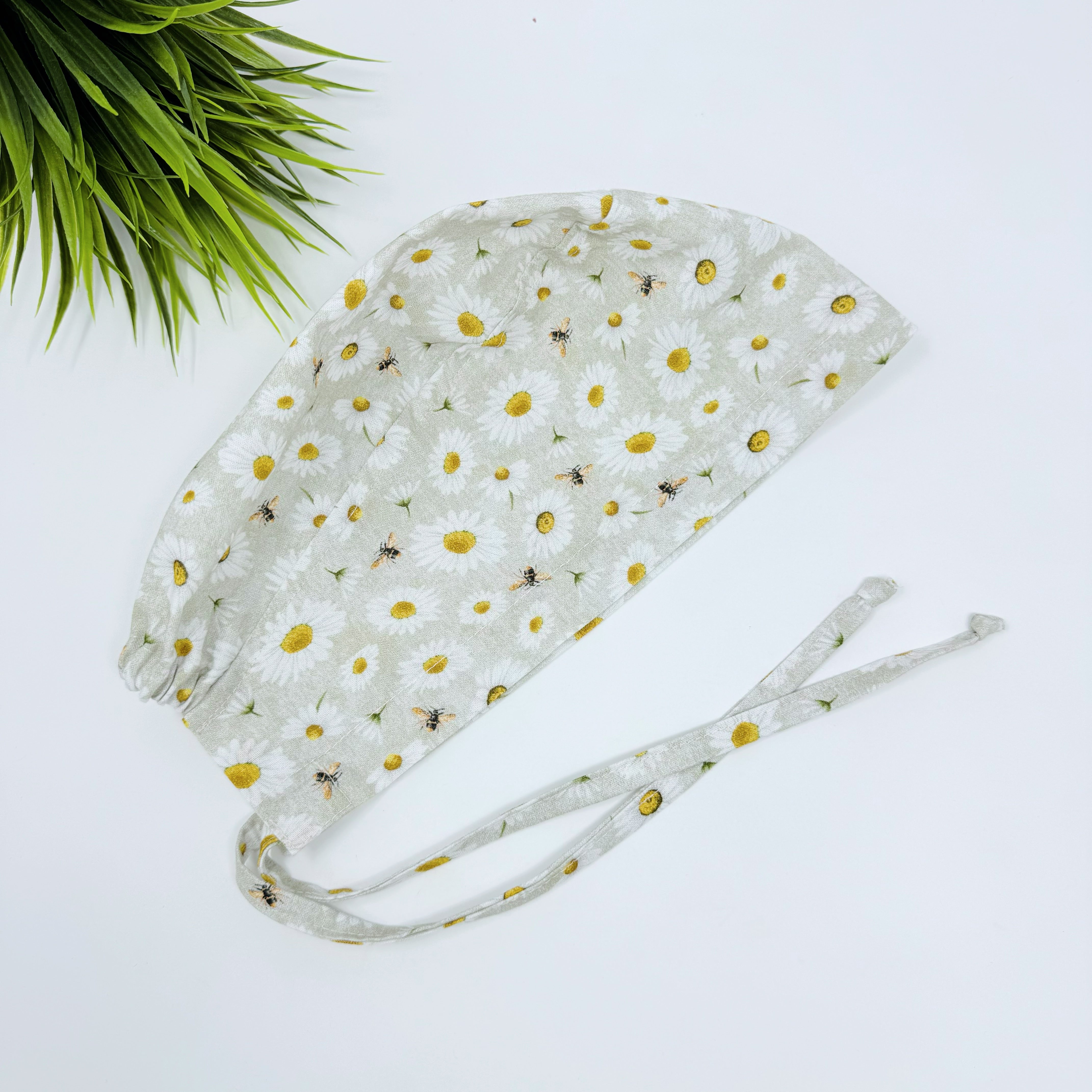 Bee And Daisy Skull tie-back style surgical scrub cap for men by Paradise Caps.