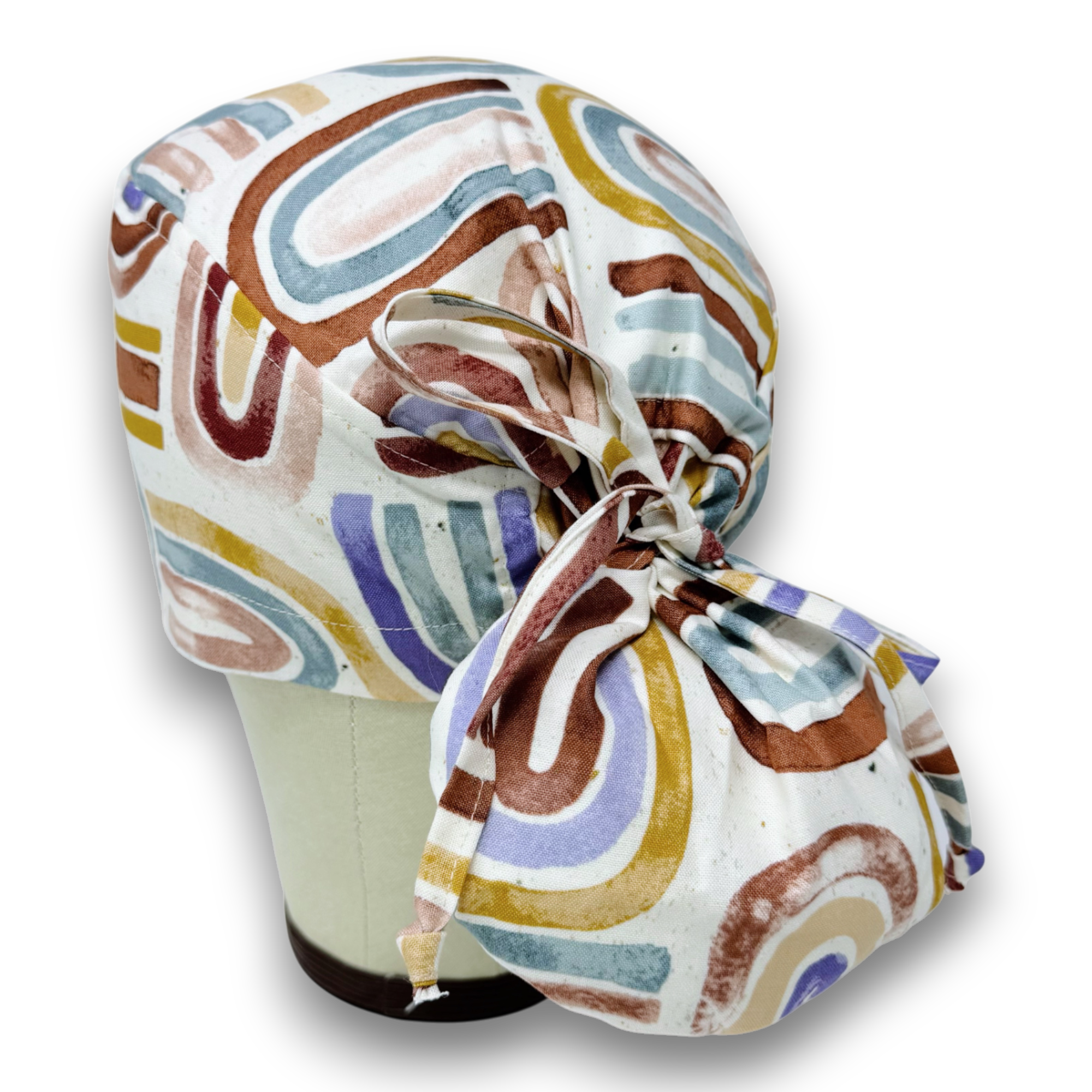 Rainbow Ponytail scrub cap for women with satin lined option by Paradise Caps.