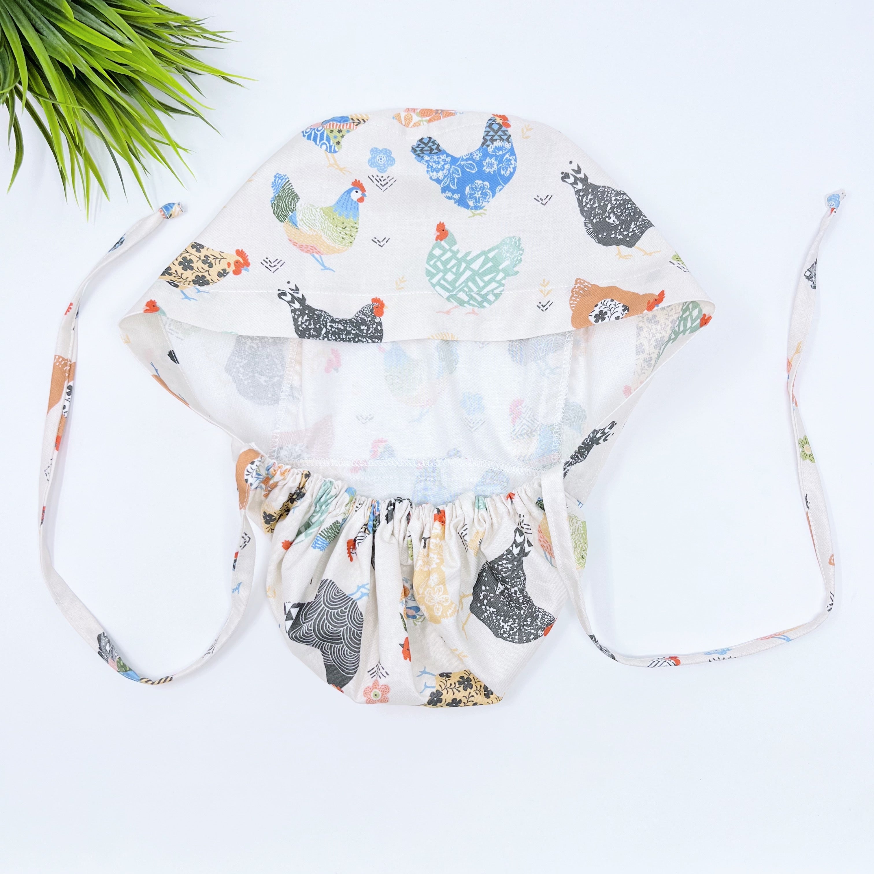 Chickens on ivory Ponytail scrub cap, Surgical cap women. Satin Lined Option Surgical cap with ponytail.