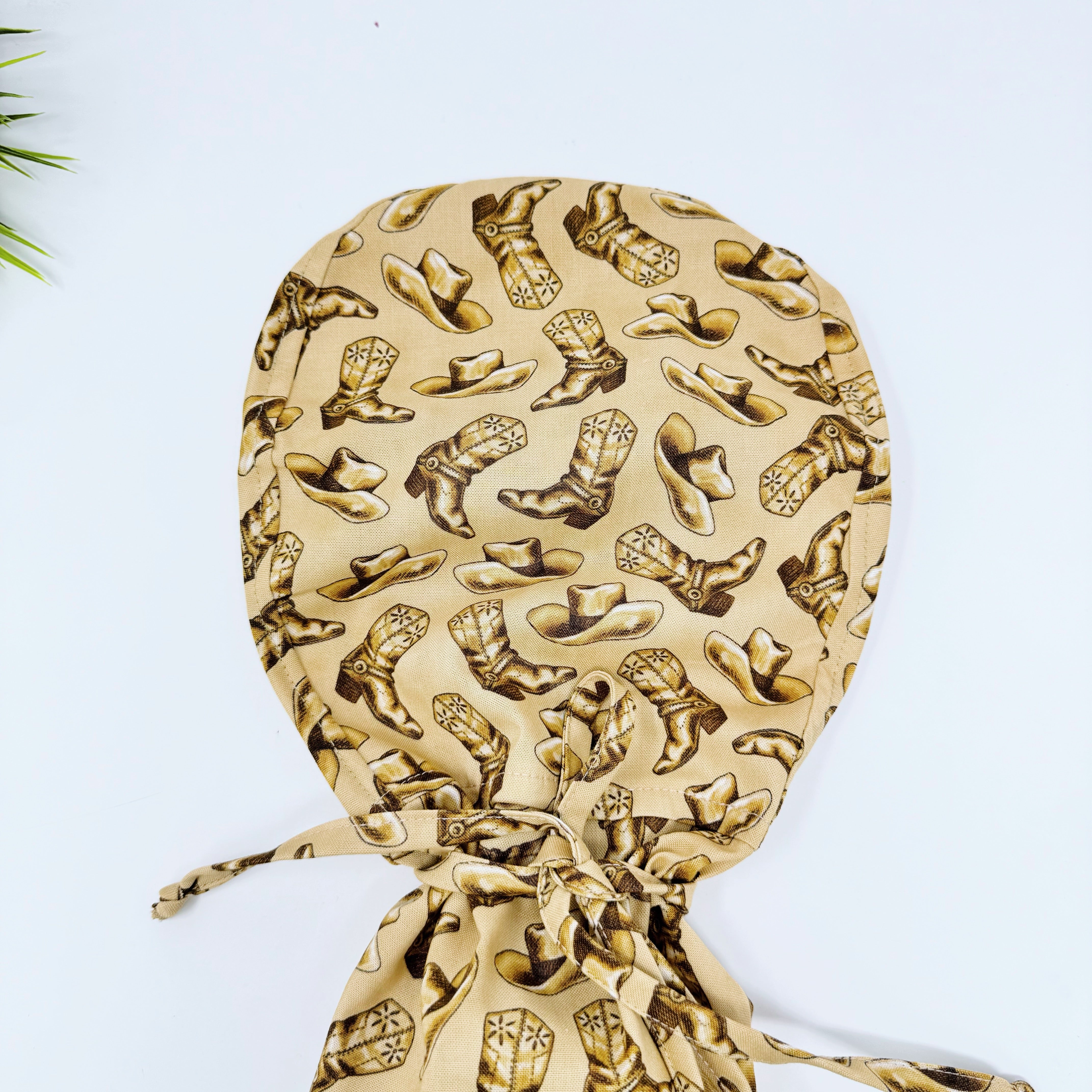 Cowboys Ponytail scrub cap for women with satin lined option by Paradise Caps.
