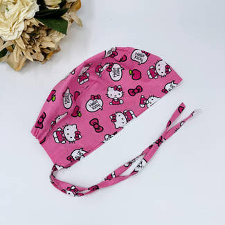 Pink surgical Skull tie-back style surgical scrub cap for men by Paradise Caps.