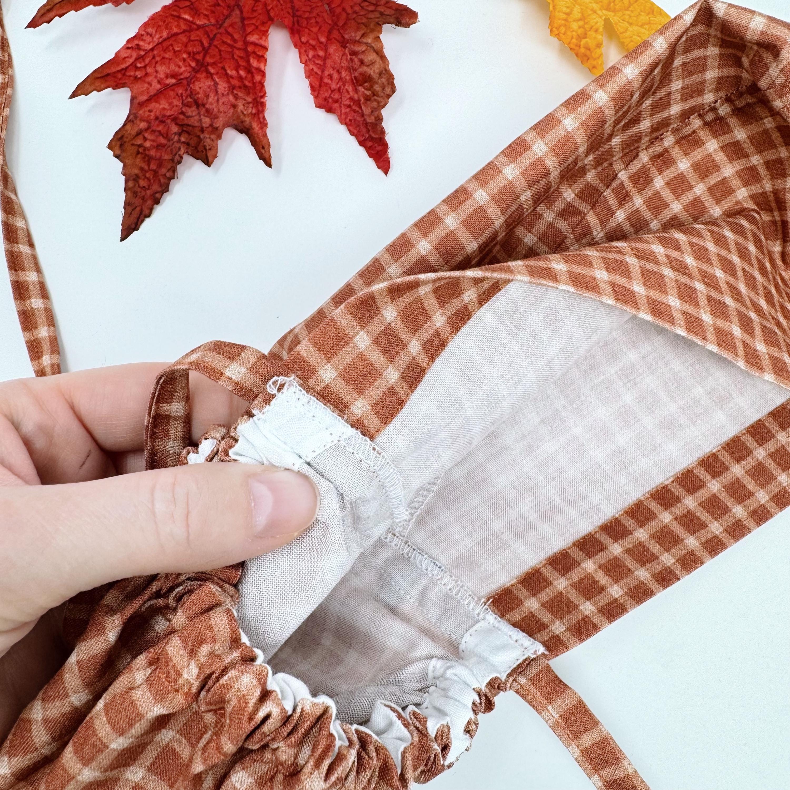 Rustic Check Ponytail scrub cap for women. Rust Surgical cap with ponytail, satin lined option by Paradise Caps.