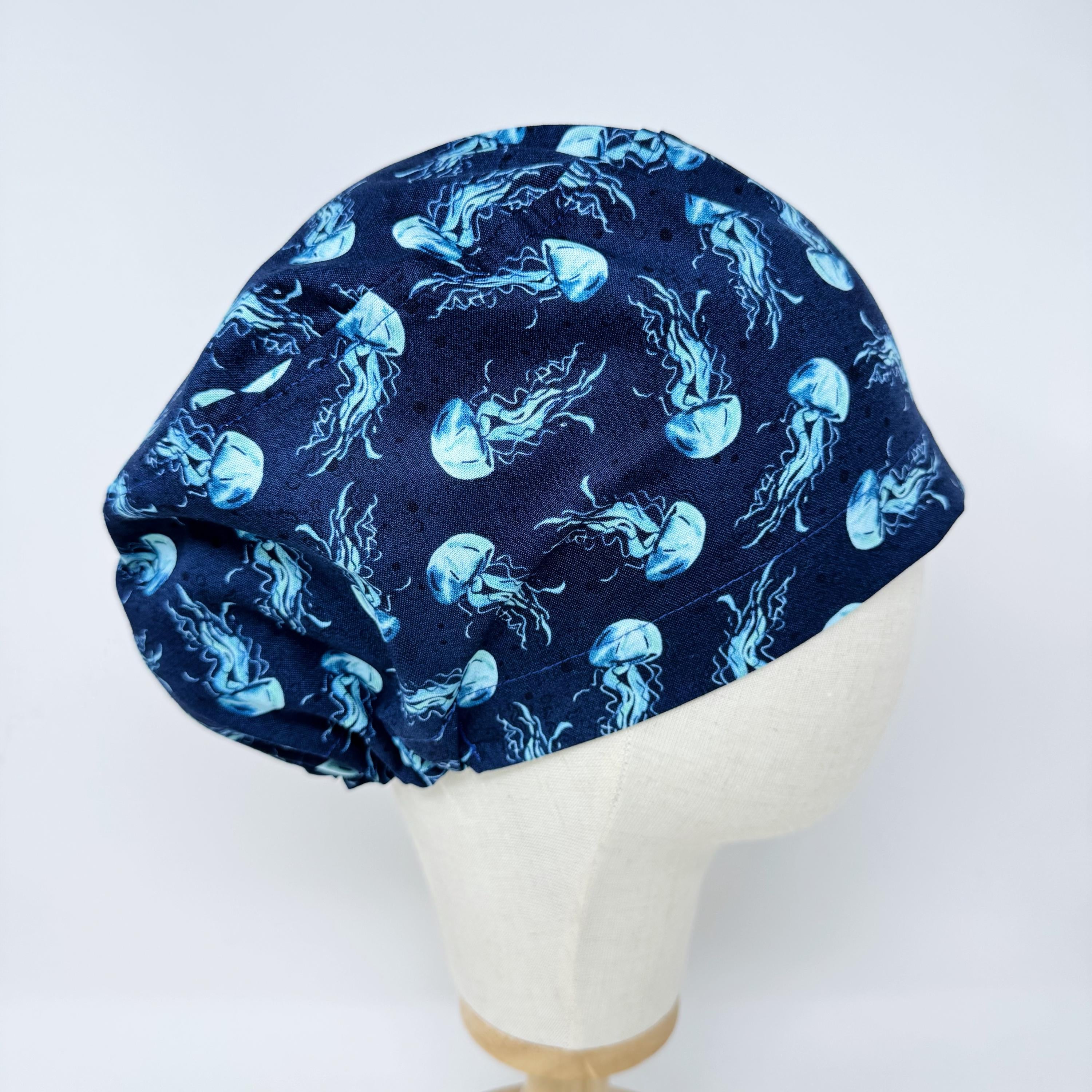 Jellyfish Euro scrub cap for women. Navy Blue Ocean Print surgical hap with satin lined option by Paradise Caps.