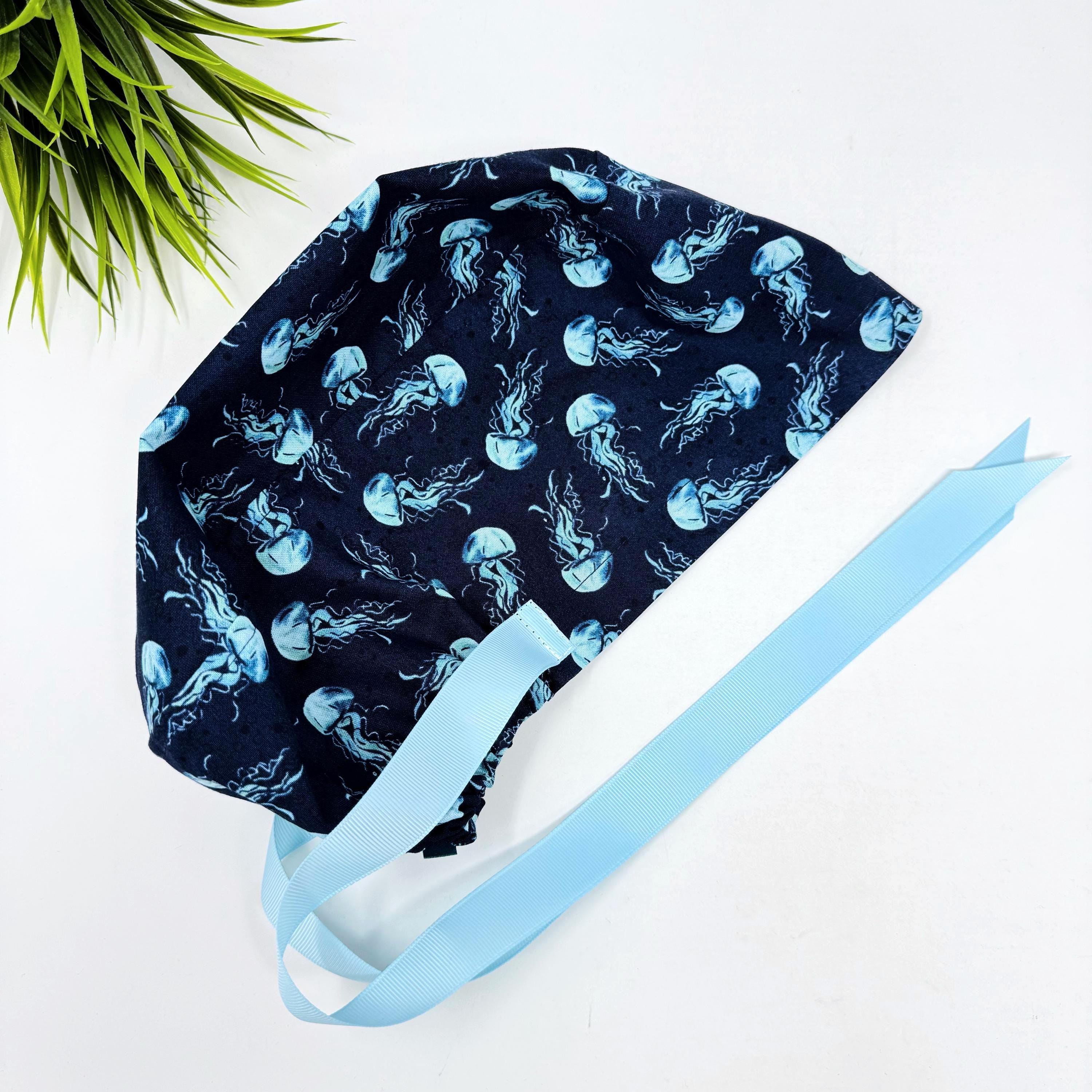 Jellyfish Euro scrub cap with ties for women. Navy Blue Ocean Print European satin lined surgical cap by Paradise Caps. Euro PLUS style.