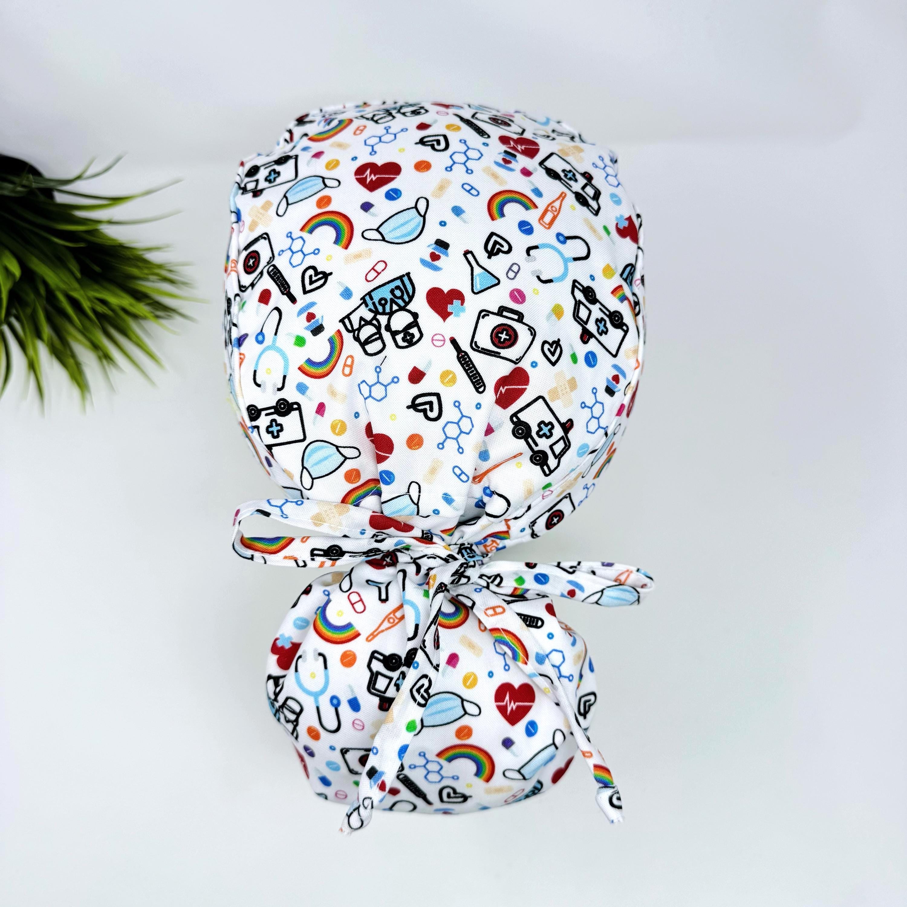 Medical Ponytail scrub cap for women. Satin lined option surgical cap with ponytail by Paradise Caps.