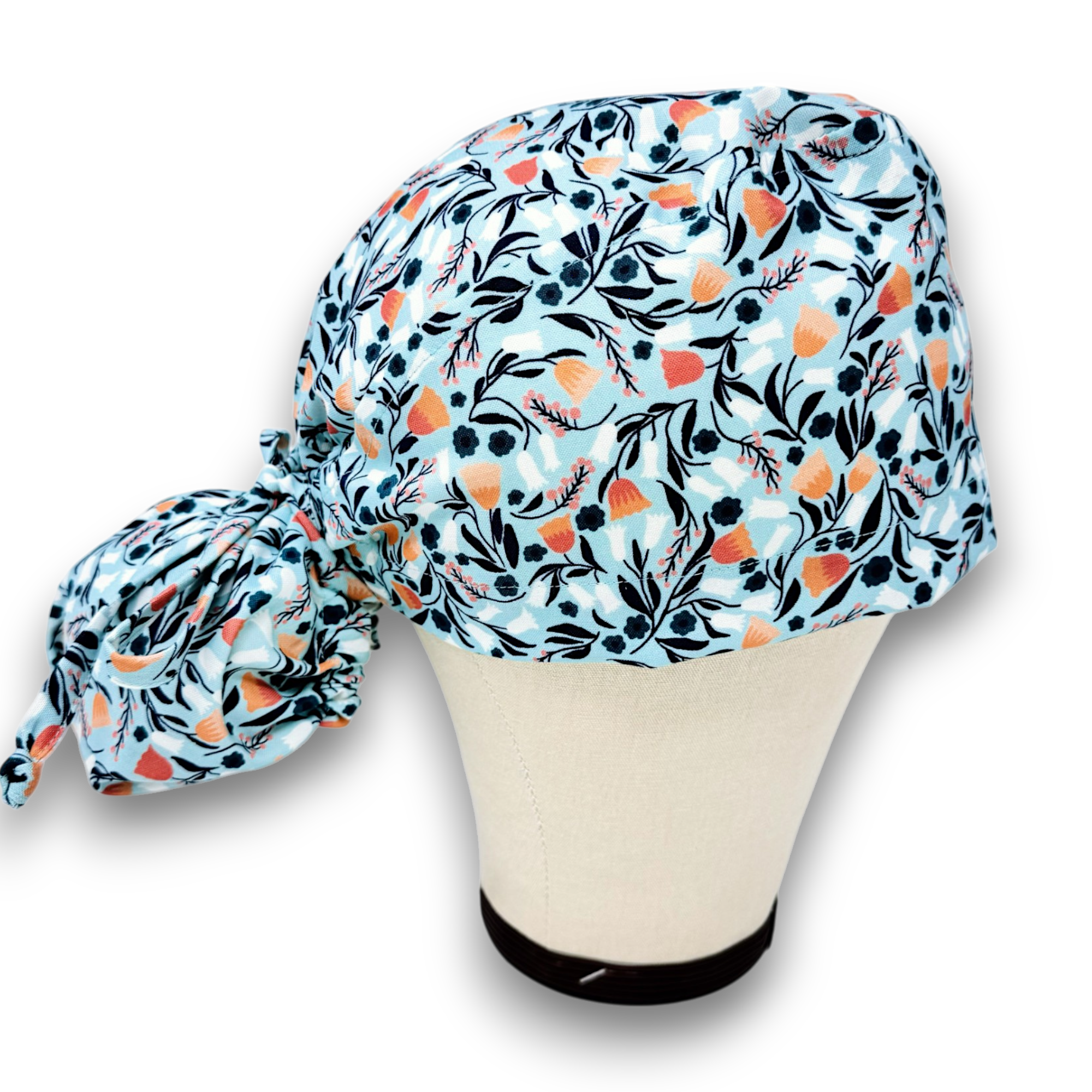 Orange bell Ponytail scrub cap for women with satin lined option by Paradise Caps.
