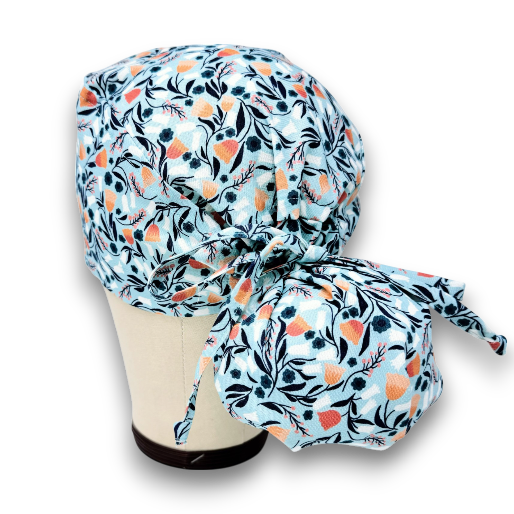 Orange bell Ponytail scrub cap for women with satin lined option by Paradise Caps.