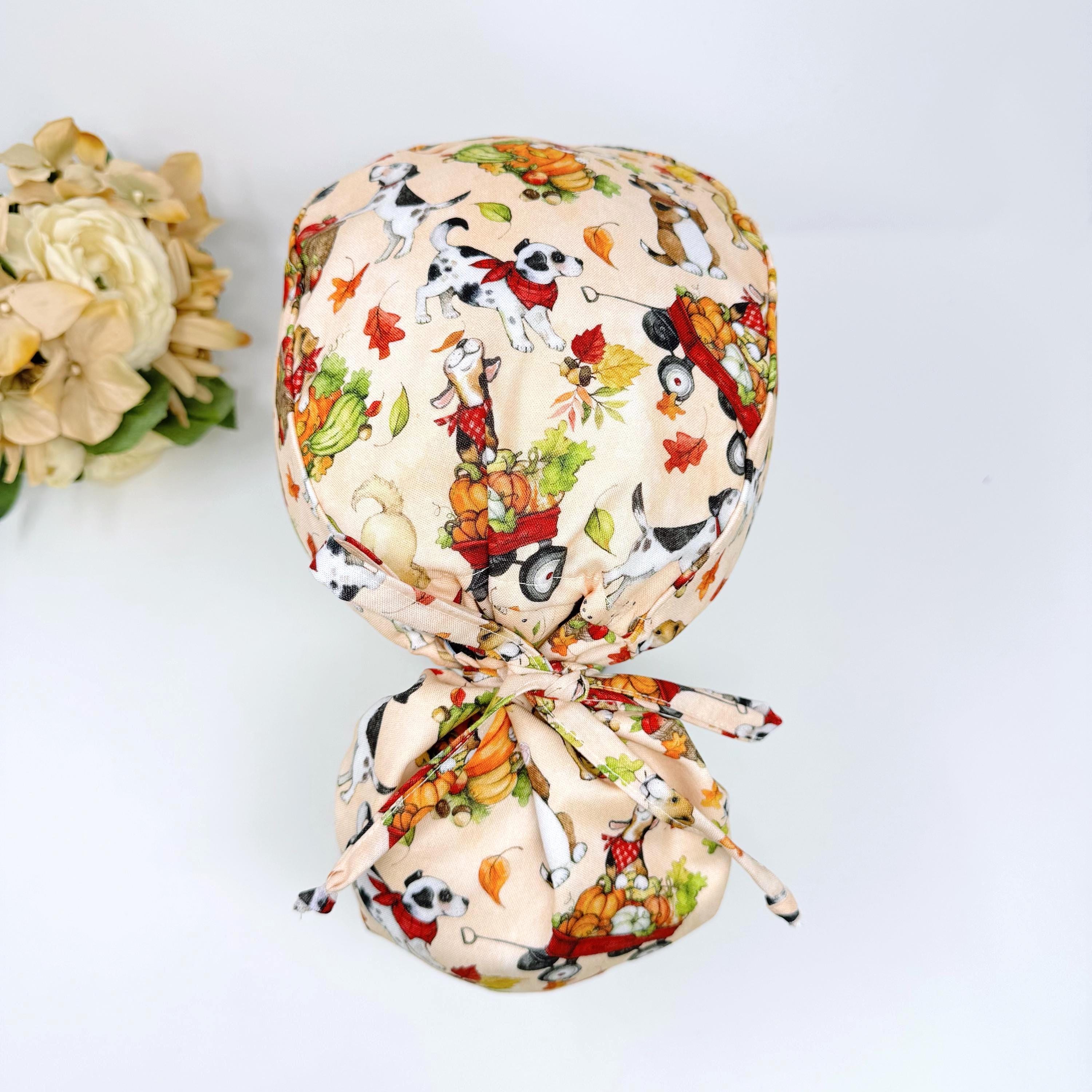Pumpkin Ponytail scrub cap for women. Thanksgiving dog Satin Lined Option Surgical cap with ponytail by Paradise Caps.