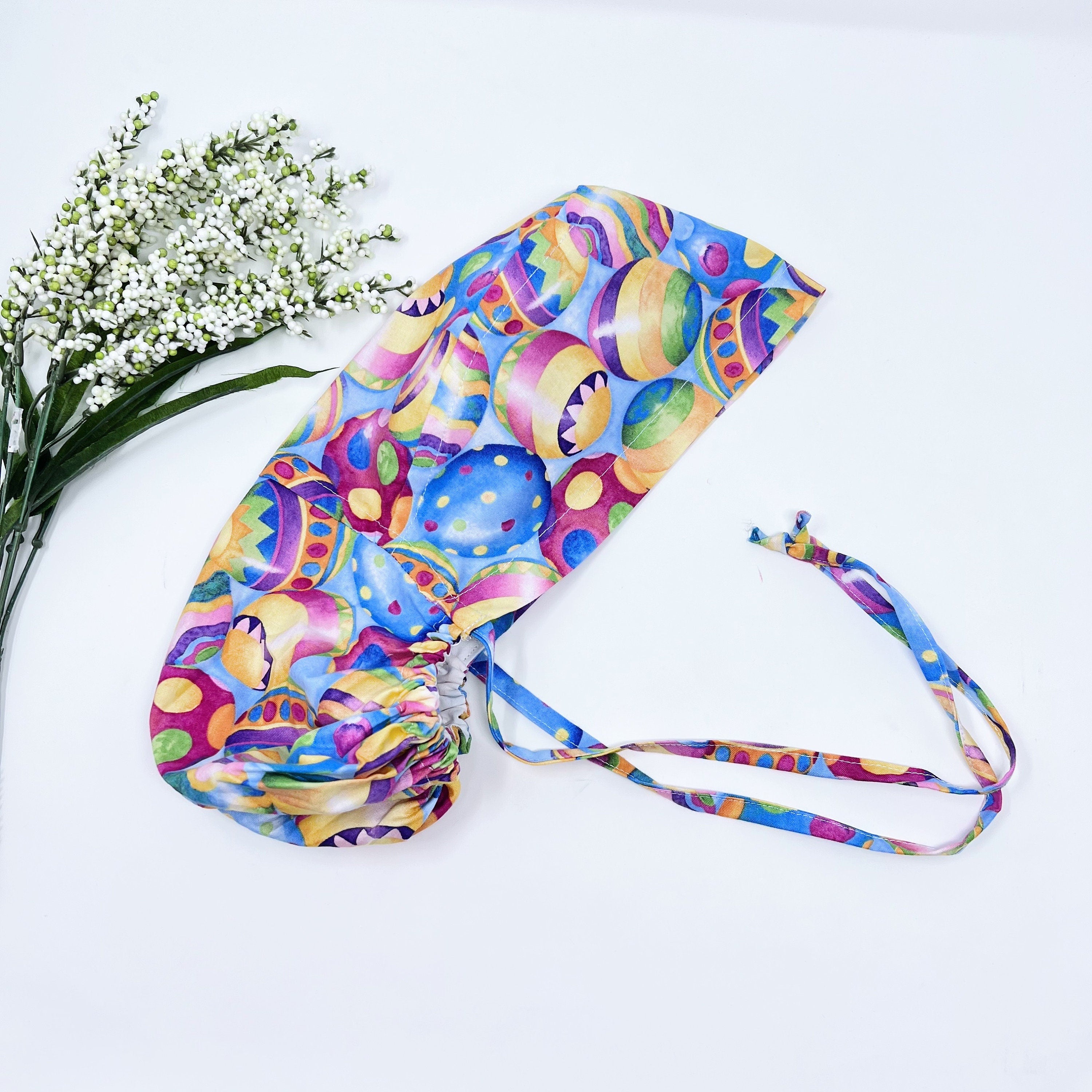 Easter Egg Ponytail scrub cap for women with satin lined option by Paradise Caps.