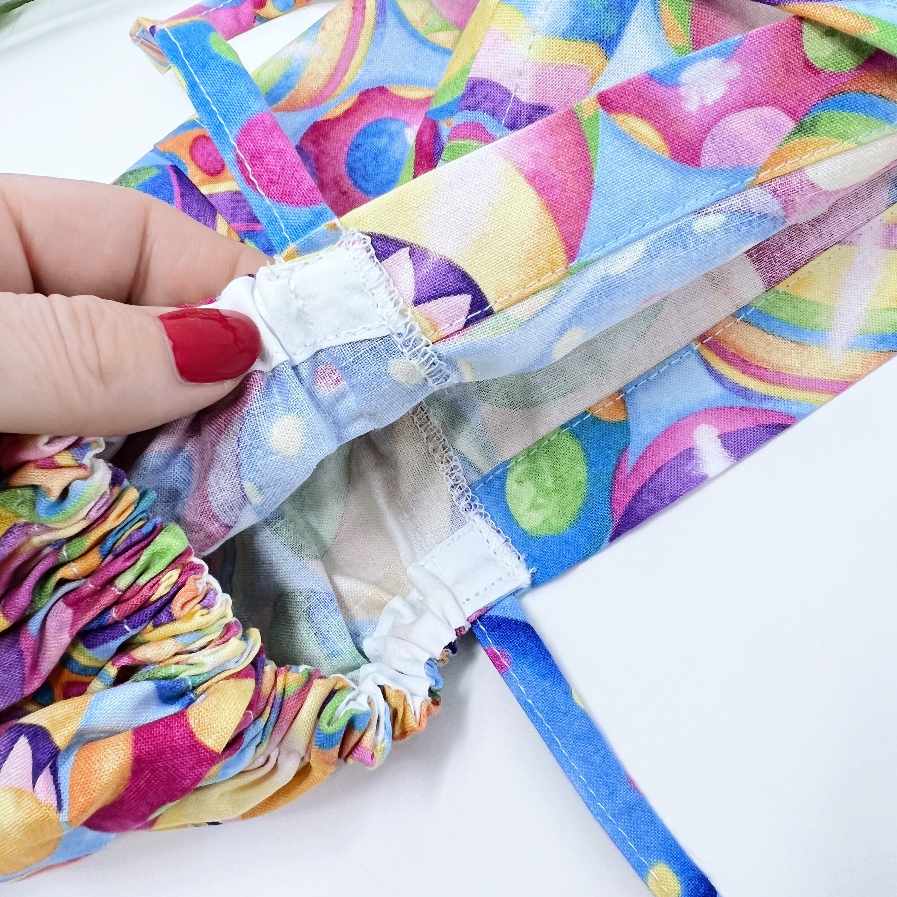 Easter Egg Ponytail scrub cap for women with satin lined option by Paradise Caps.