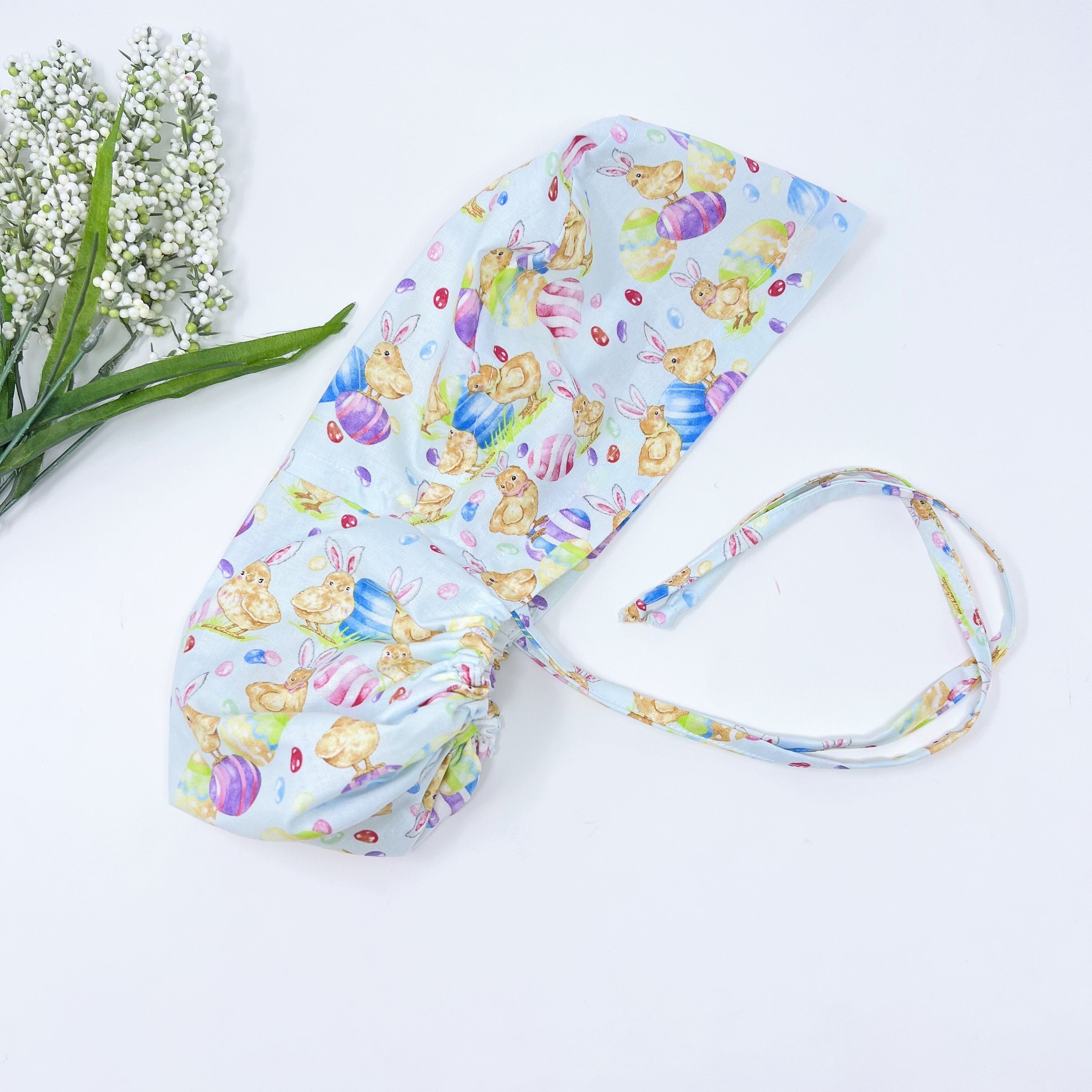 Easter Egg Ponytail scrub cap for women with satin lined option by Paradise Caps.