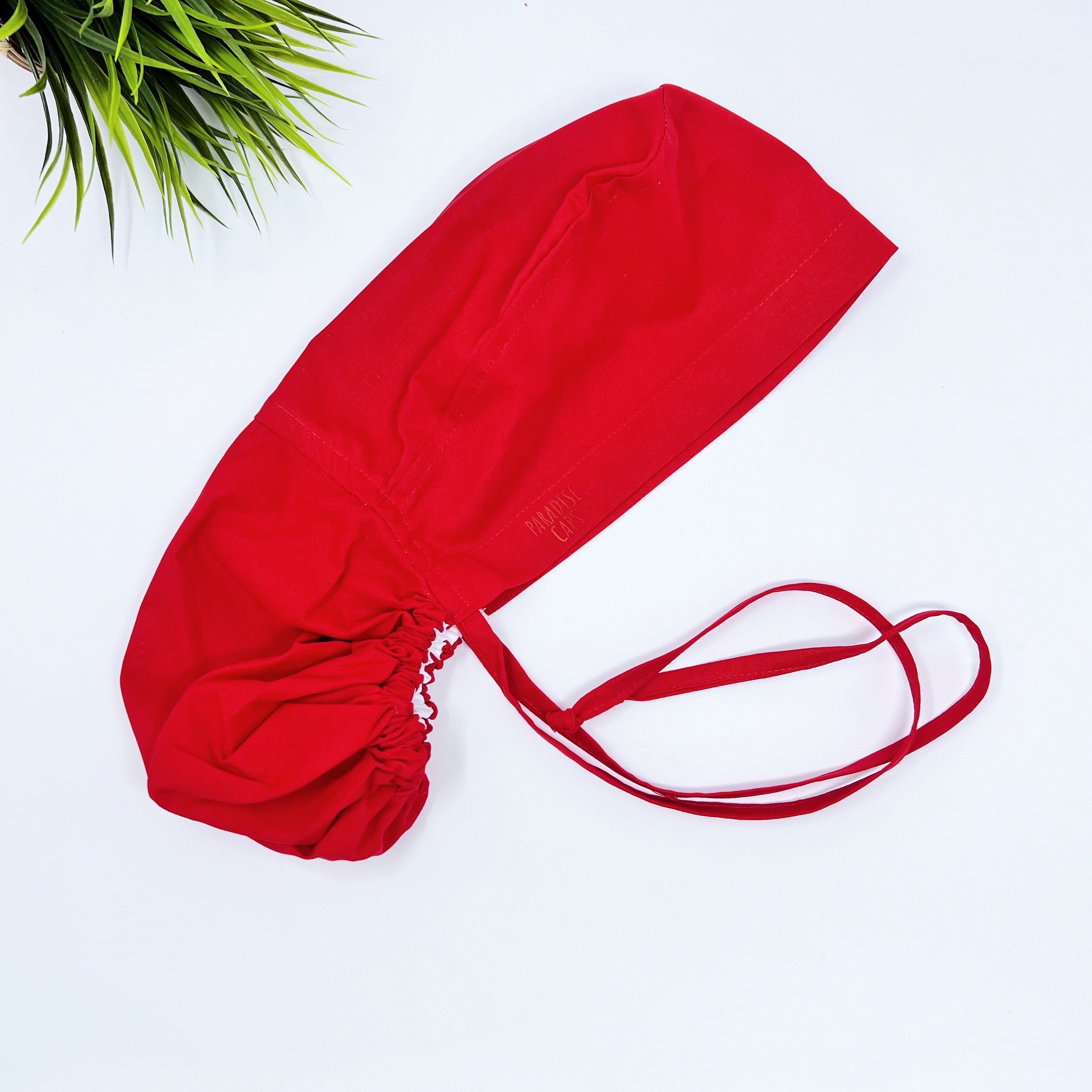 Solid red Ponytail scrub cap for women with satin lined option by Paradise Caps.