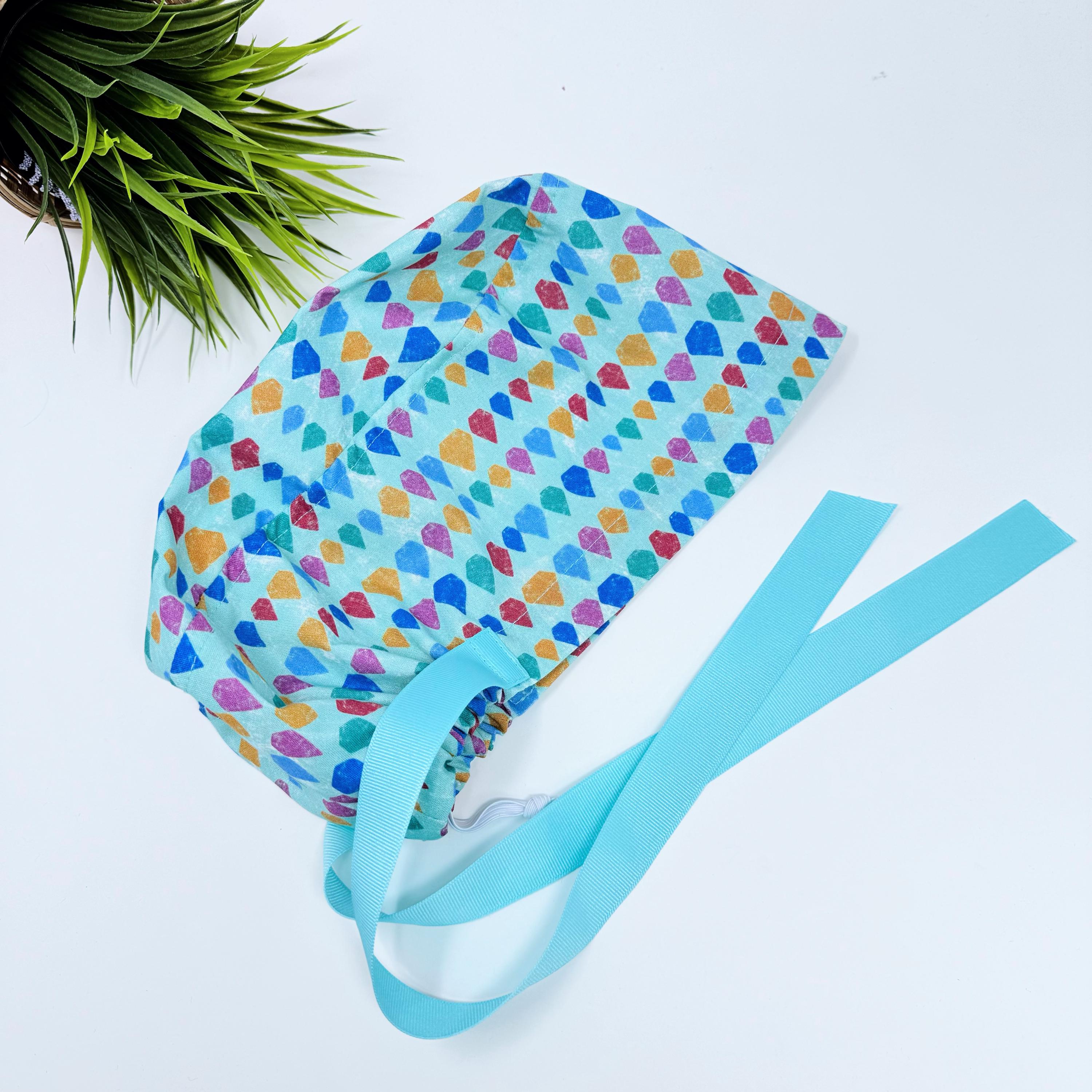 Aqua Scales Euro scrub cap with ties for Women by Paradise Caps. Euro PLUS style.