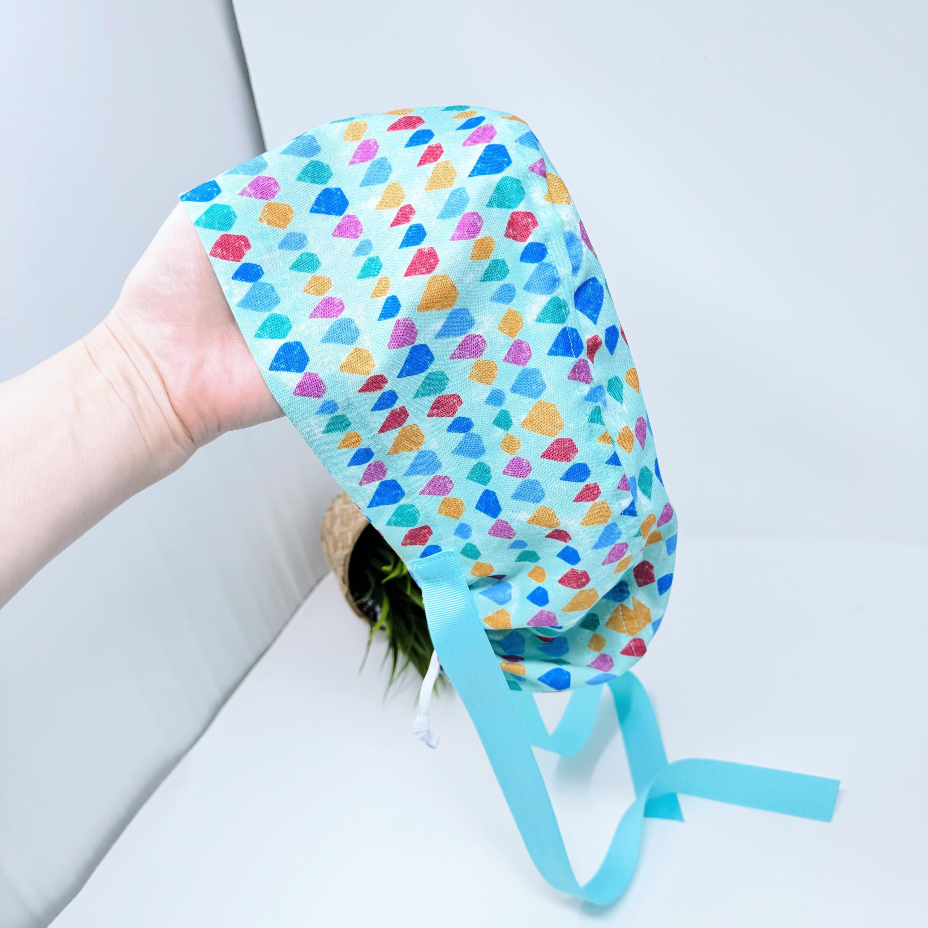 Aqua Scales Euro scrub cap with ties for Women by Paradise Caps. Euro PLUS style.