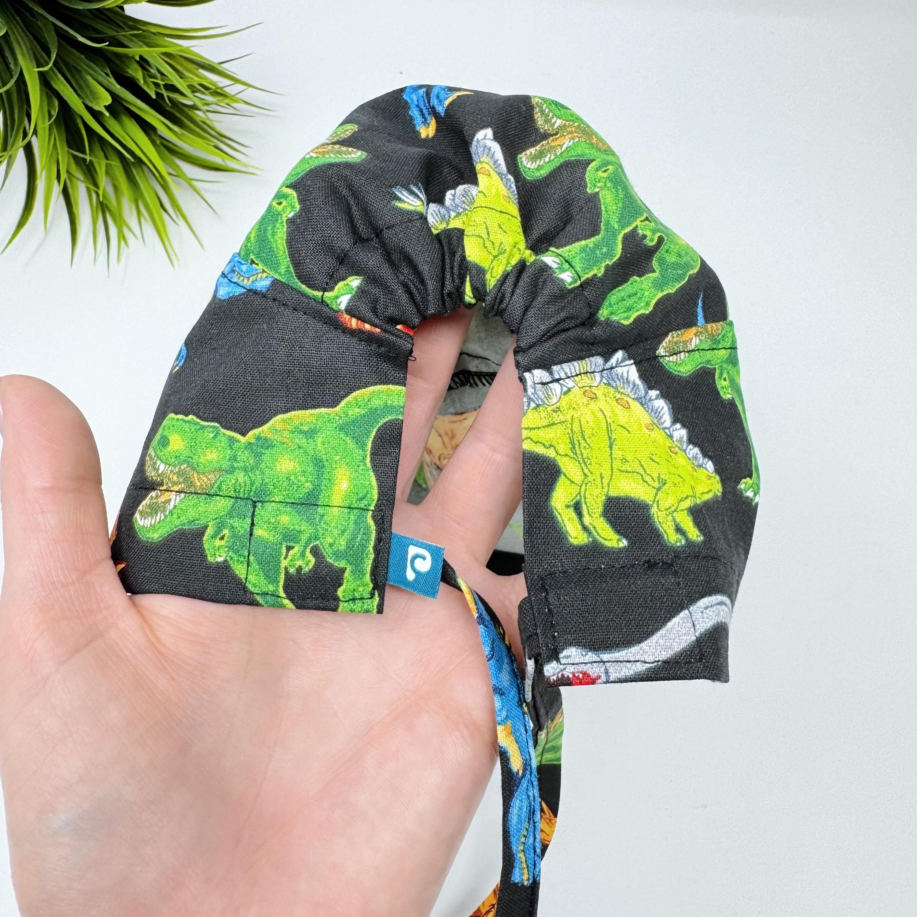Dinosaur Skull tie-back style surgical scrub cap for men by Paradise Caps.