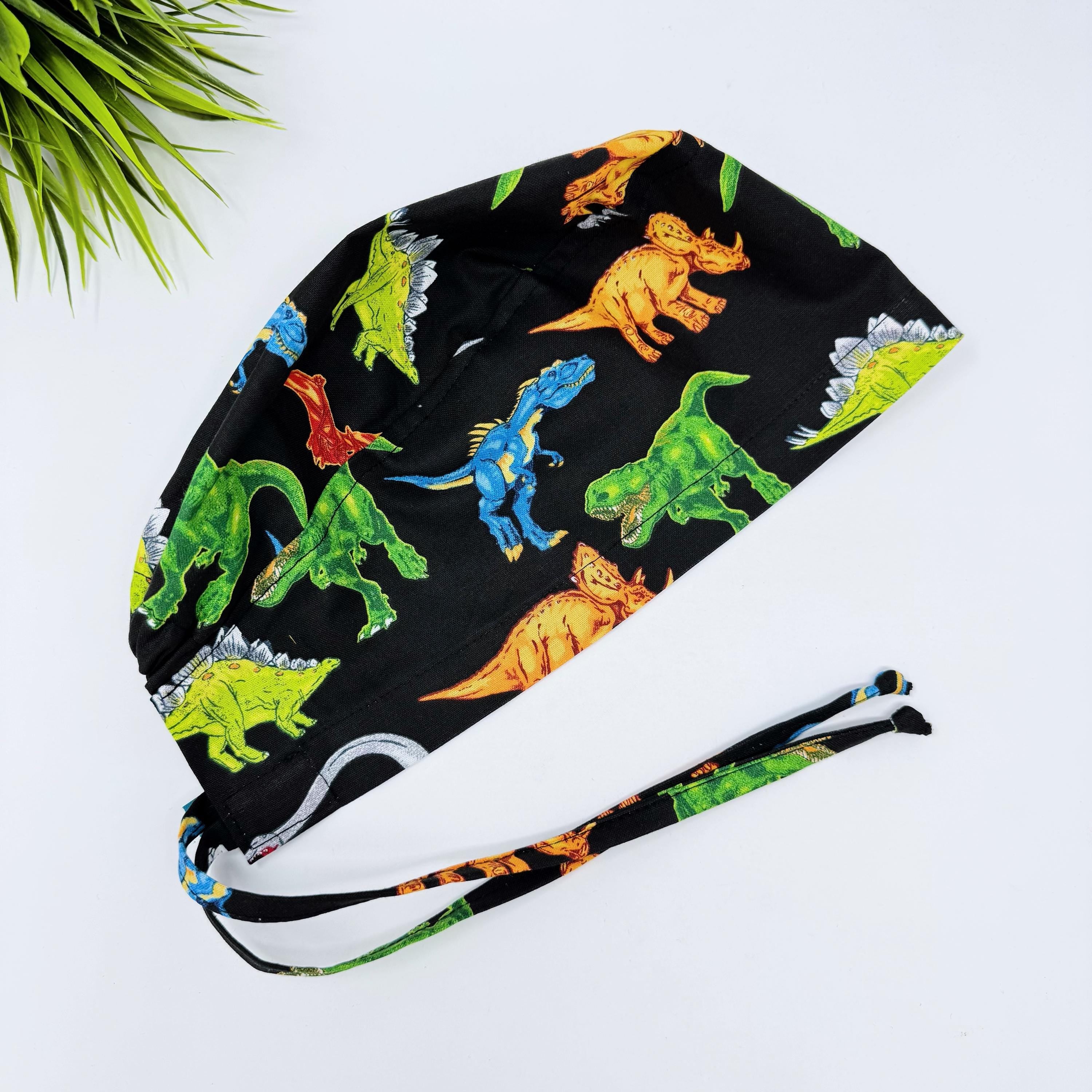 Dinosaur Skull tie-back style surgical scrub cap for men by Paradise Caps.