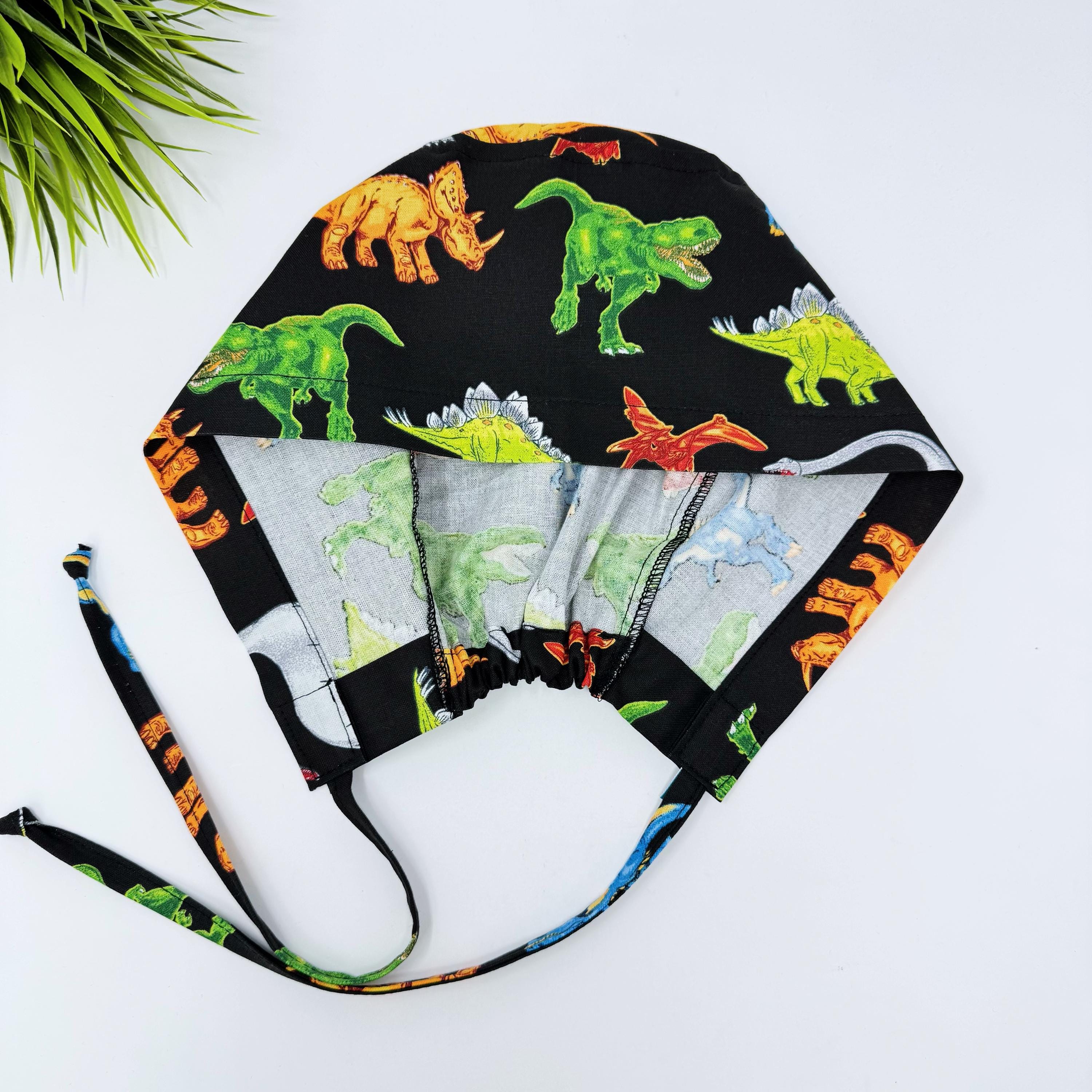 Dinosaur Skull tie-back style surgical scrub cap for men by Paradise Caps.