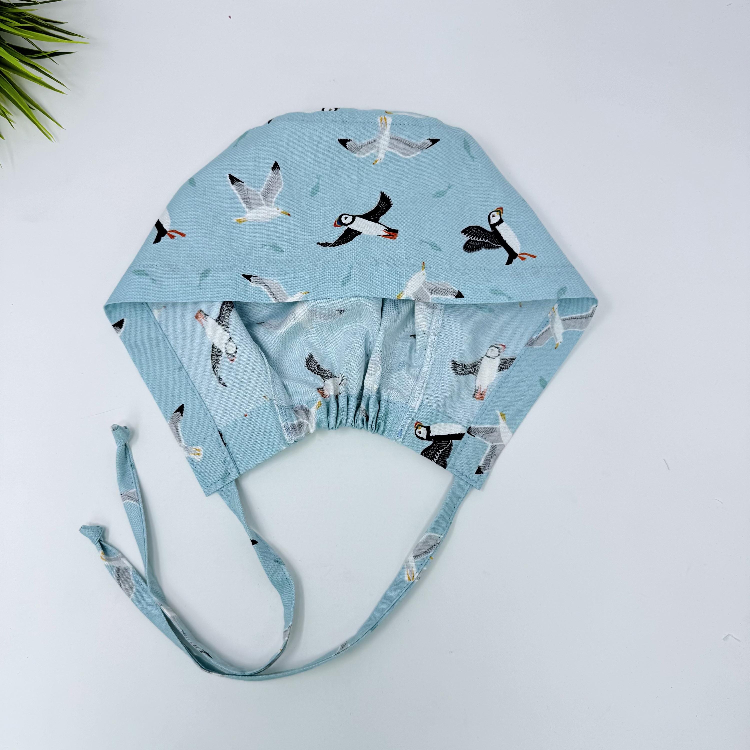 Puffin Skull tie-back style surgical scrub cap for men by Paradise Caps.