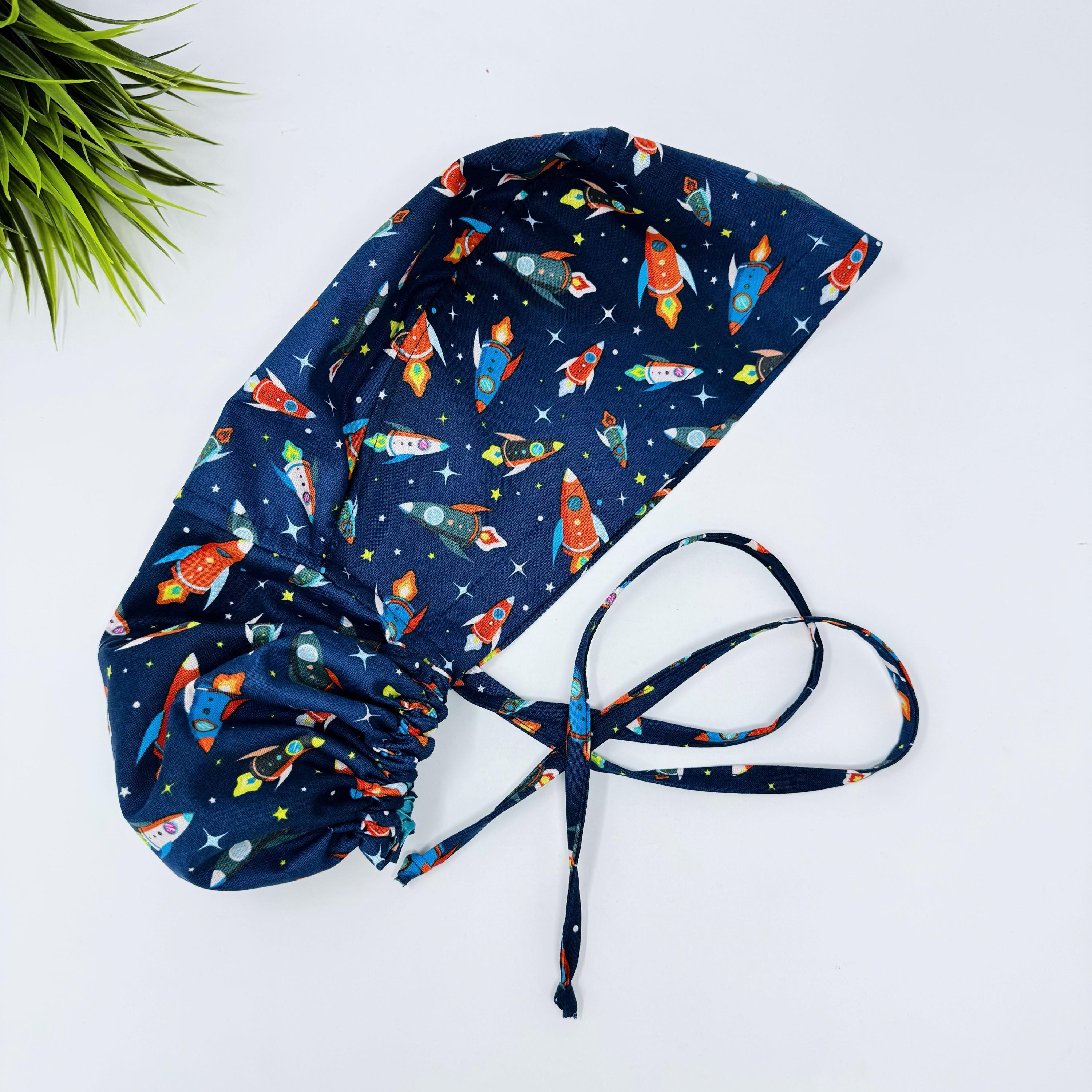 Rocket Ponytail scrub cap for women with satin lined option by Paradise Caps.