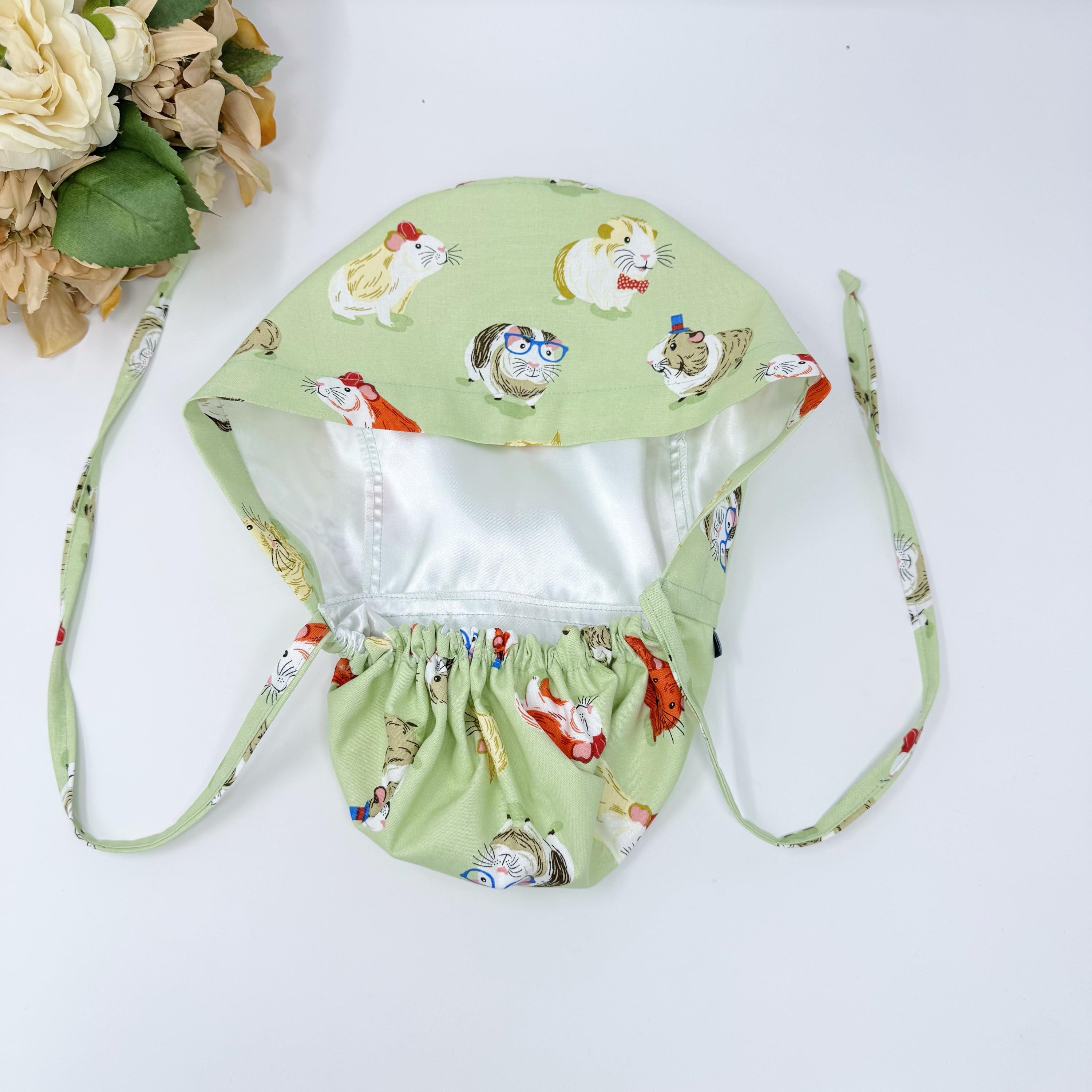 Guinea pig Ponytail scrub cap for women with satin lined option by Paradise Caps.