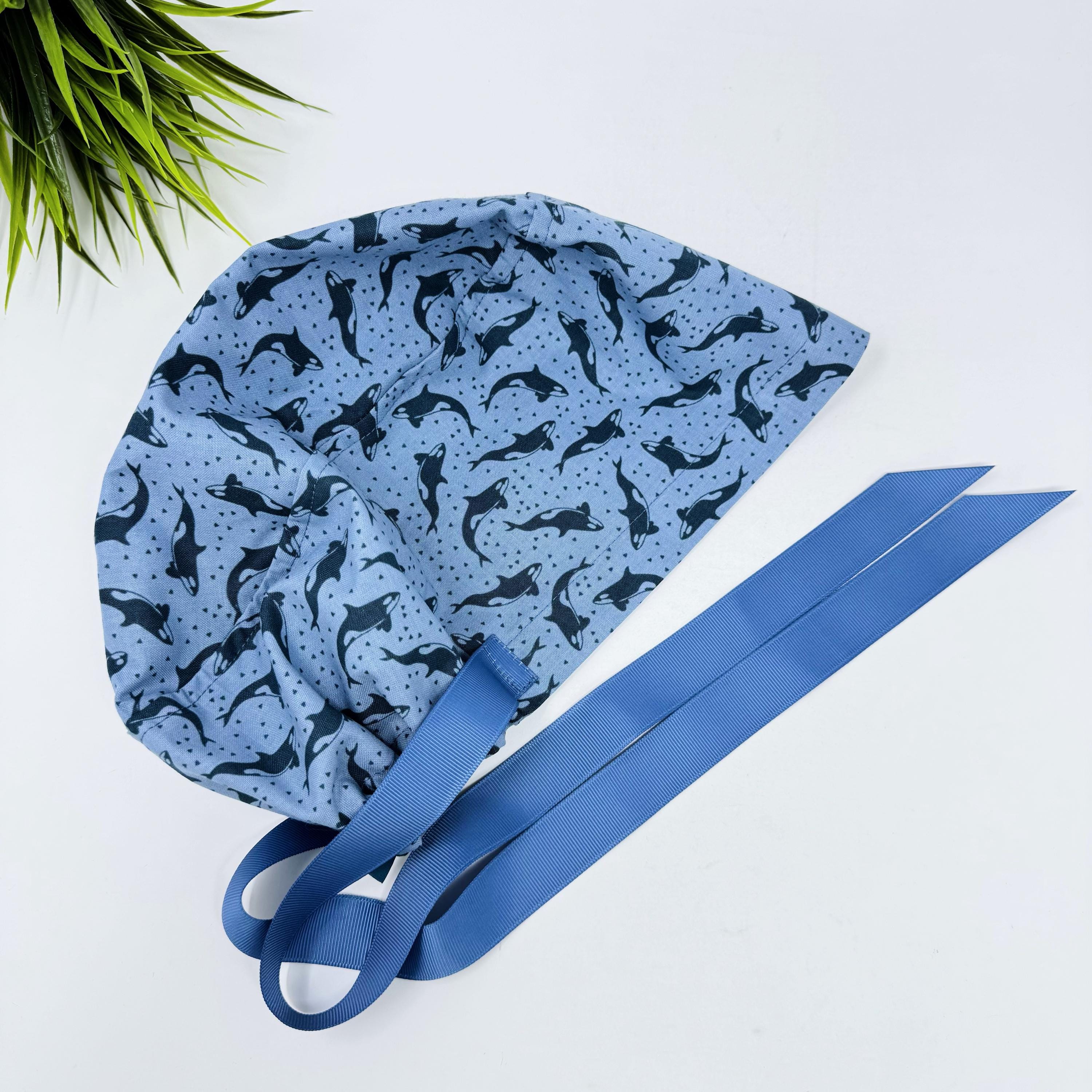 Ocean Orcas Euro scrub cap with ties for women. Blue Sea European satin lined surgical cap by Paradise Caps. Euro PLUS style.