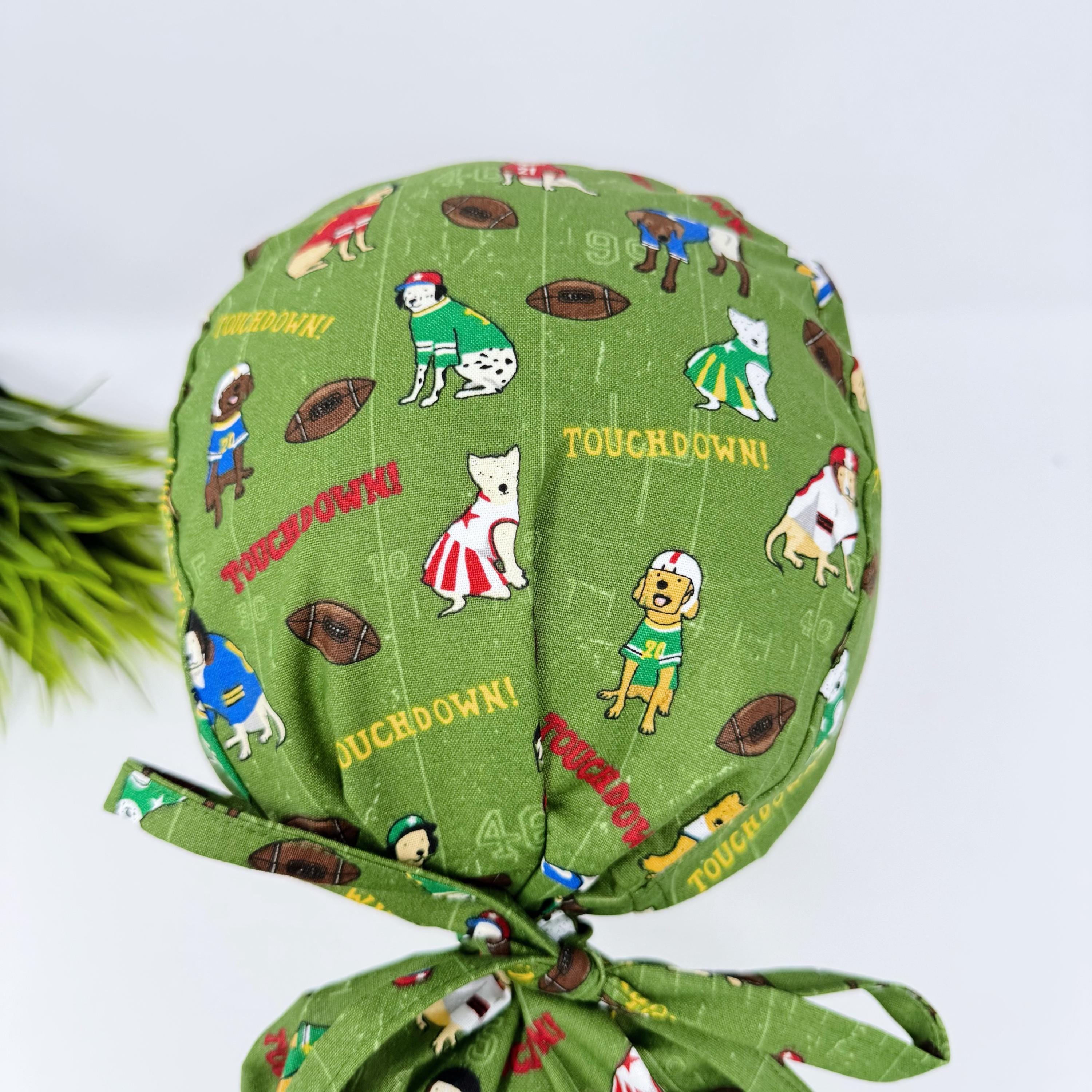 Ponytail scrub cap by Paradise Caps. Football Dogs surgical hat for women.