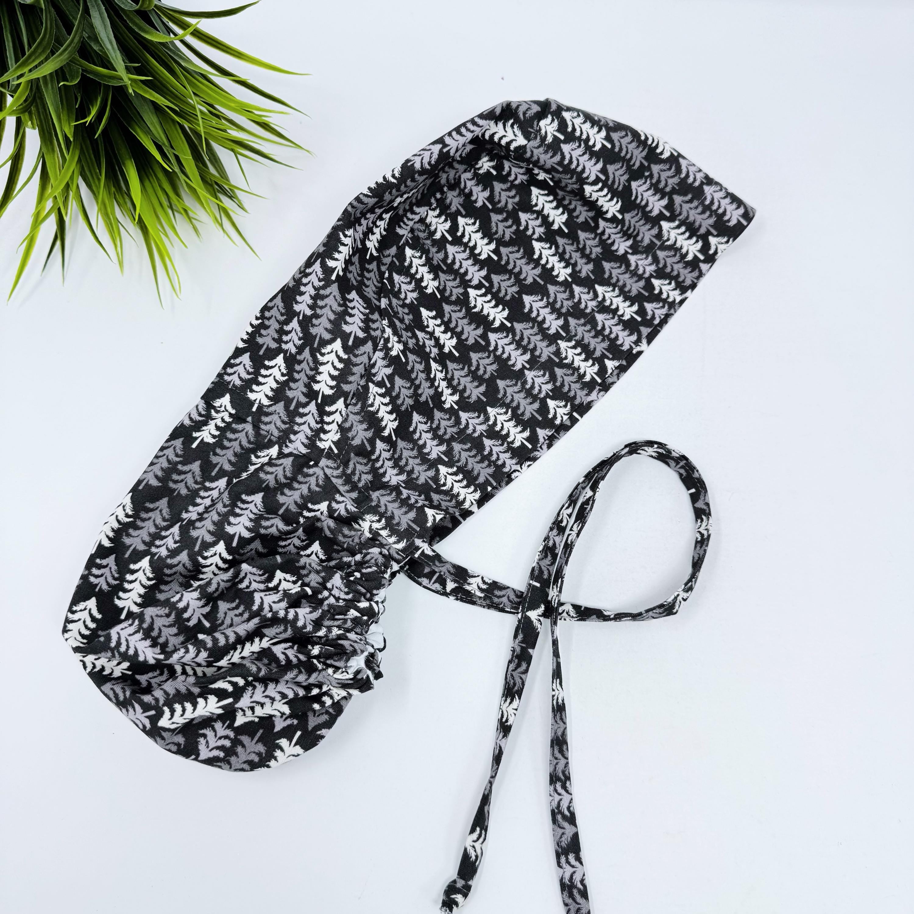 Ponytail scrub cap for women with satin lined option. Nordic Pines Surgical hat with ponytail by Paradise Caps.