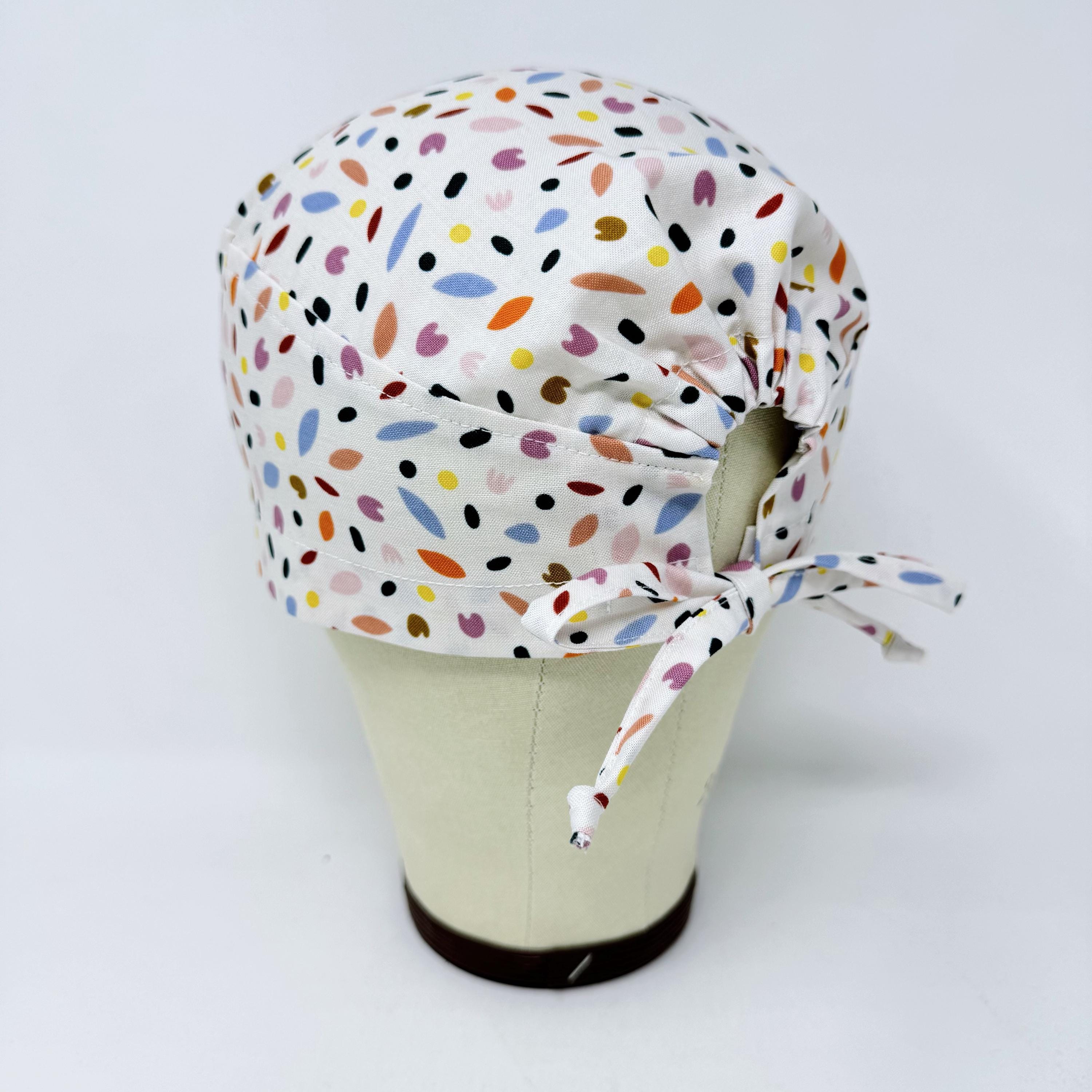 Spring Petals Skull tie-back style surgical scrub cap by Paradise Caps.