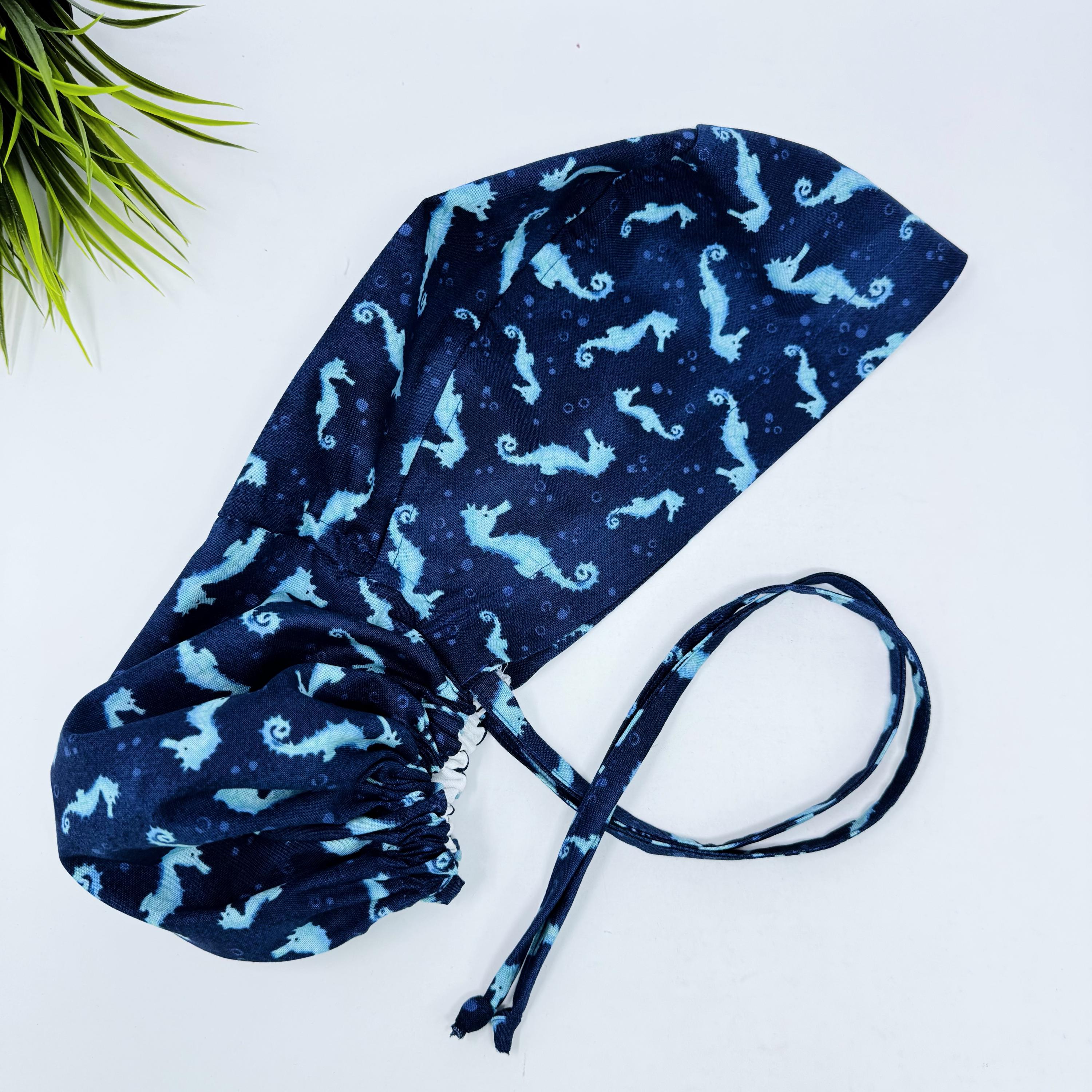 Ponytail scrub cap women. Ocean Seahorse Print Satin Lined option Ponytail scrub hat. Scrub caps for women by Paradise Caps.
