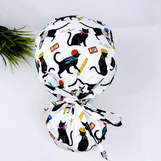 Ponytail scrub cap by Paradise Caps. Parisian Cat Surgical hat for women with satin lined option.