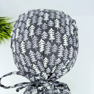 Ponytail scrub cap for women with satin lined option. Nordic Pines Surgical hat with ponytail by Paradise Caps.