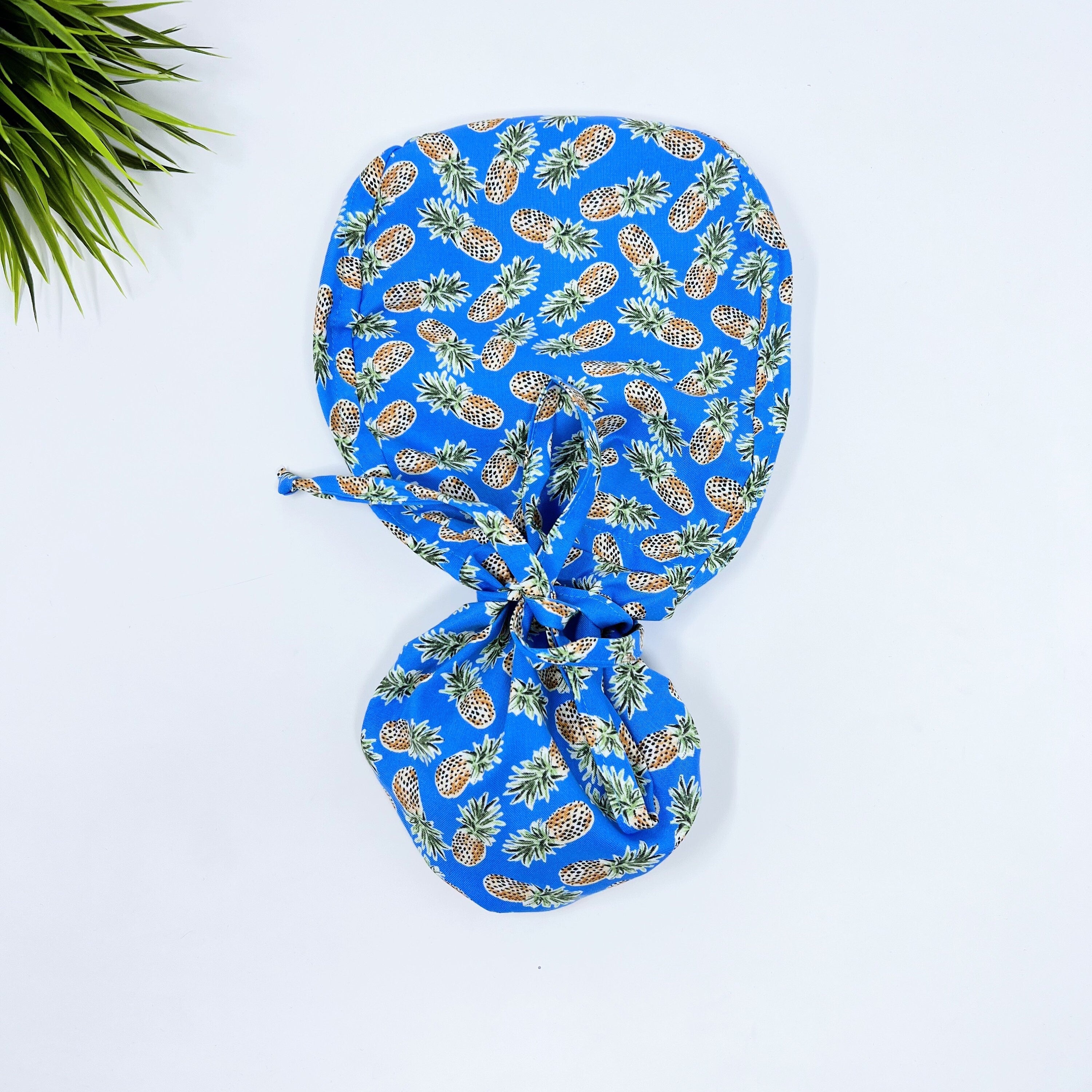 Pineapple Ponytail scrub cap for women with satin lined option by Paradise Caps.