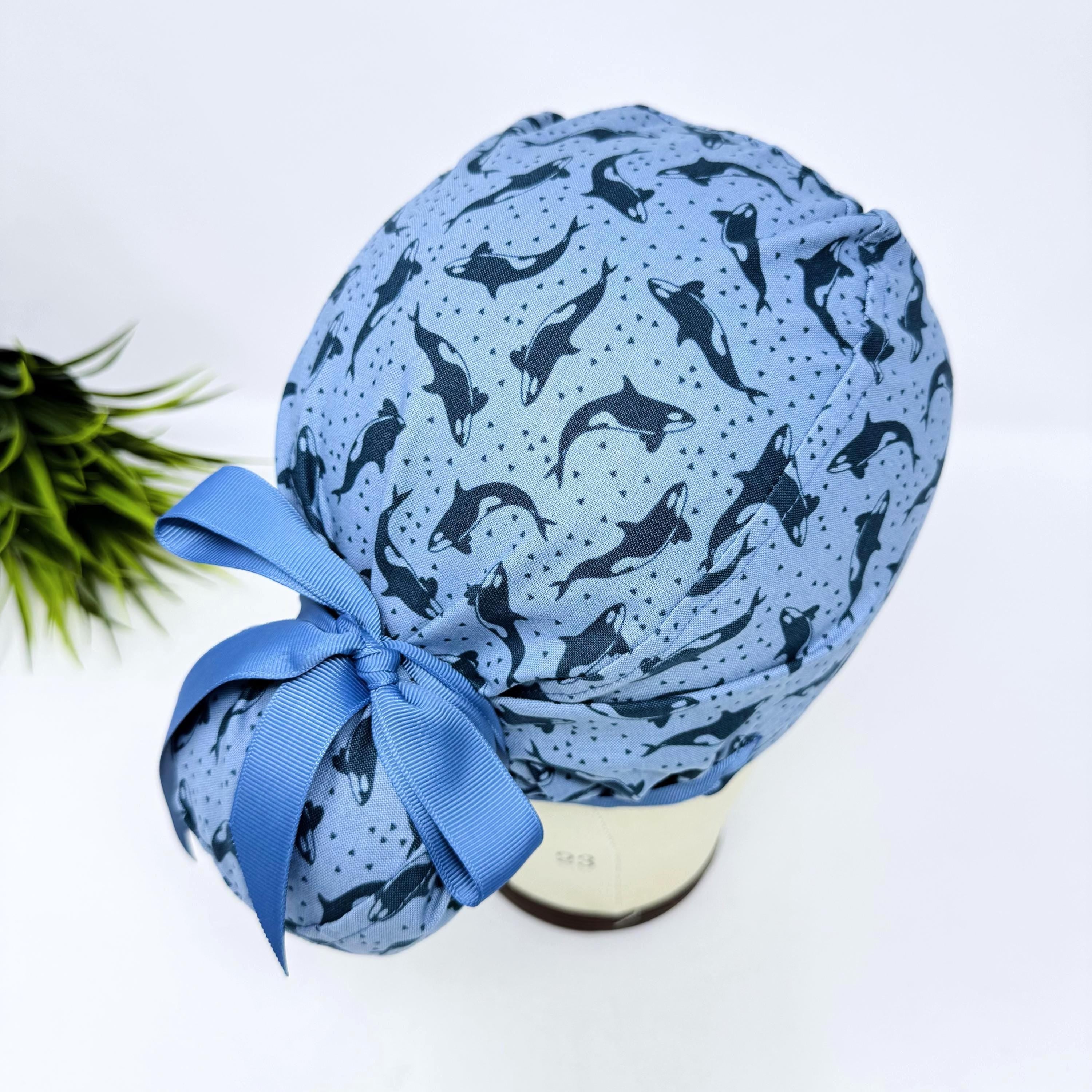 Ocean Orcas Euro scrub cap with ties for women. Blue Sea European satin lined surgical cap by Paradise Caps. Euro PLUS style.