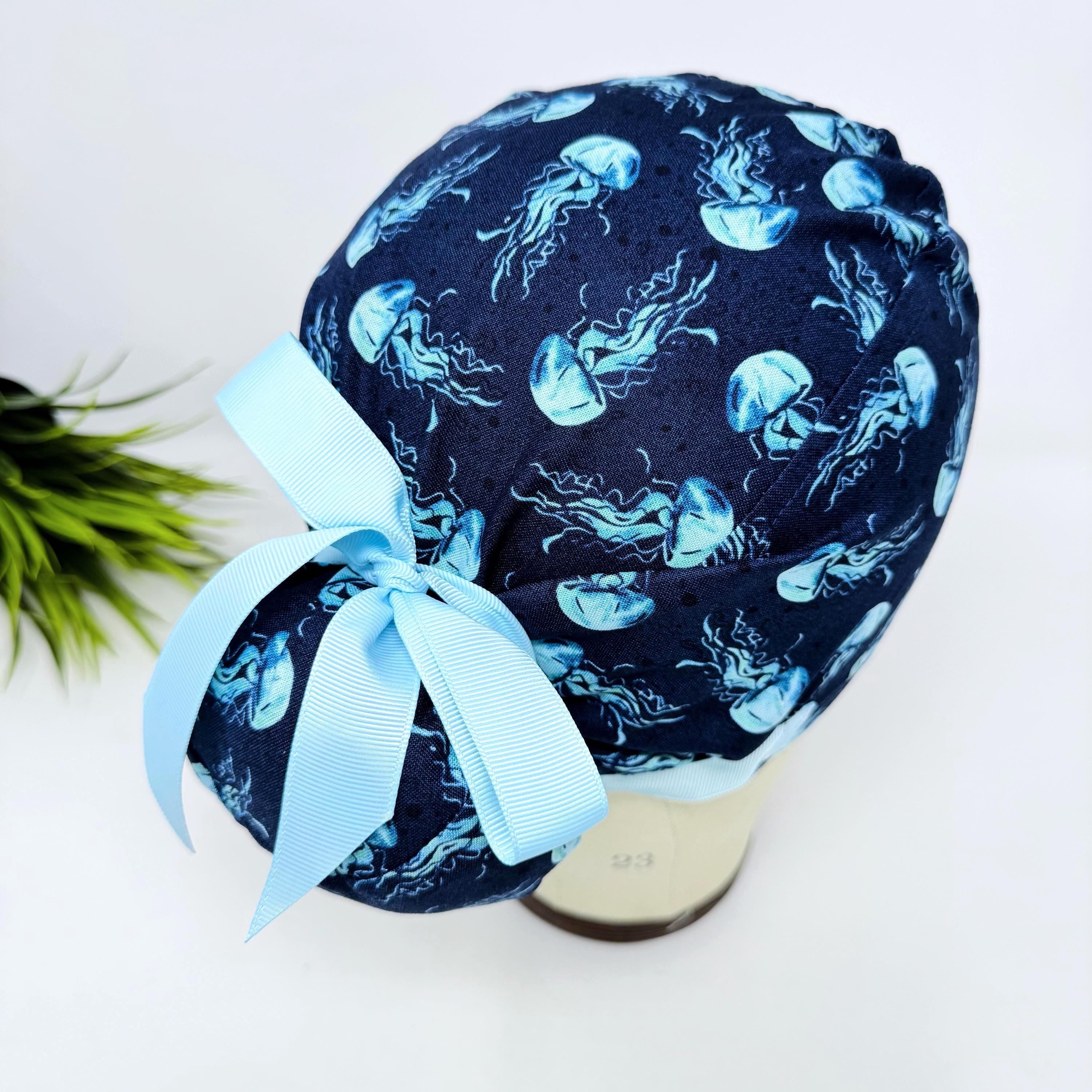 Jellyfish Euro scrub cap with ties for women. Navy Blue Ocean Print European satin lined surgical cap by Paradise Caps. Euro PLUS style.