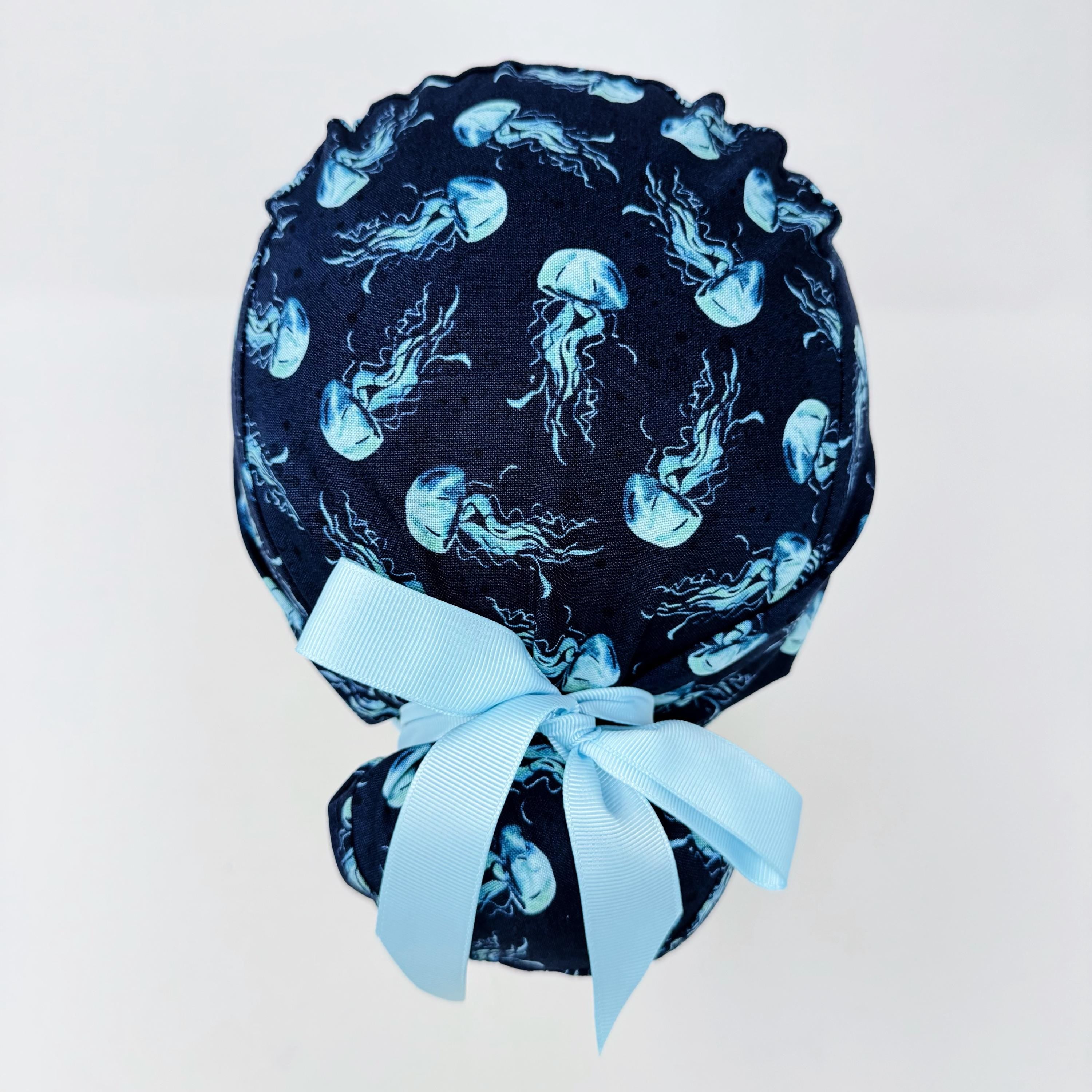 Jellyfish Euro scrub cap with ties for women. Navy Blue Ocean Print European satin lined surgical cap by Paradise Caps. Euro PLUS style.