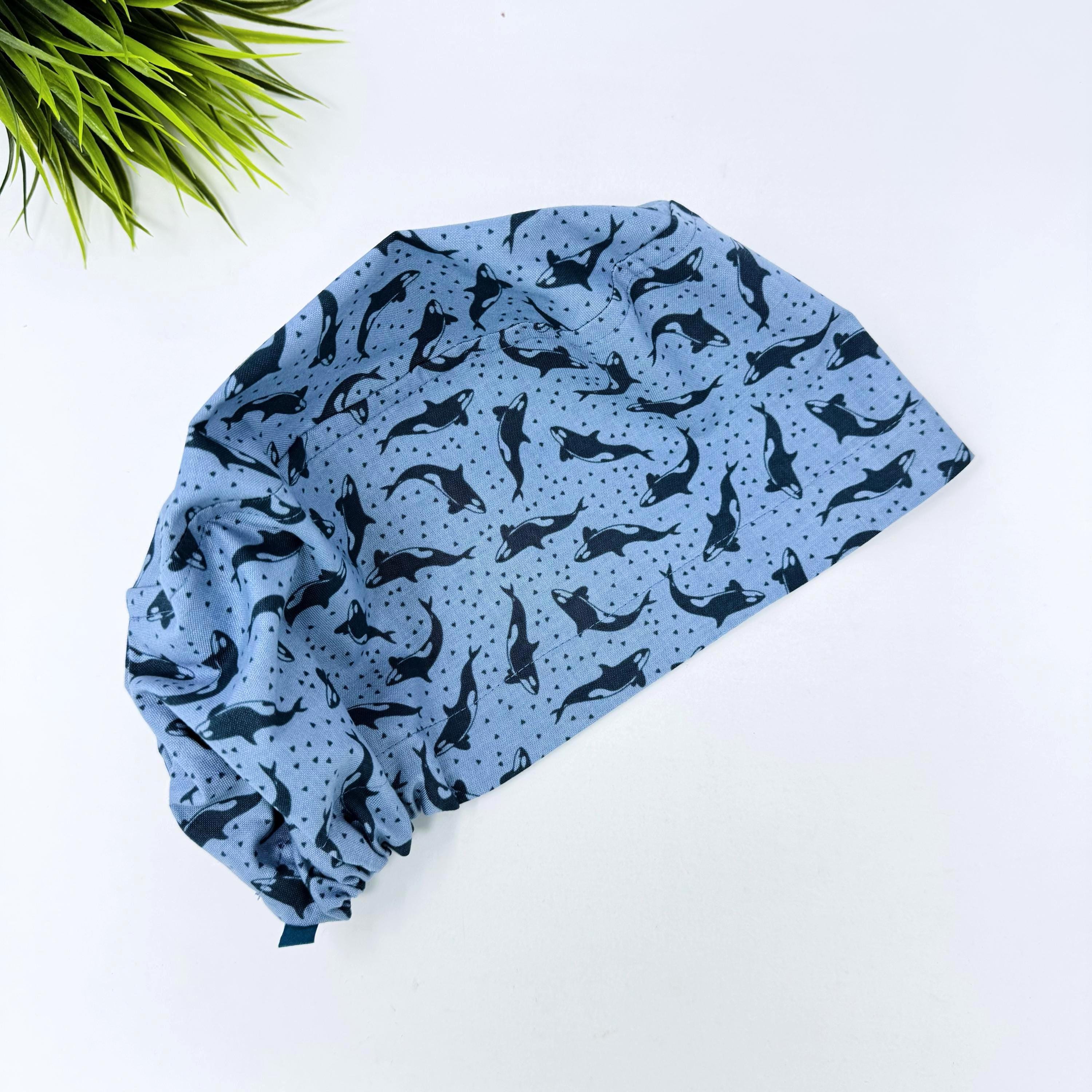 Ocean Orcas Euro scrub cap for women. Blue Sea surgical hap with satin lined option by Paradise Caps.