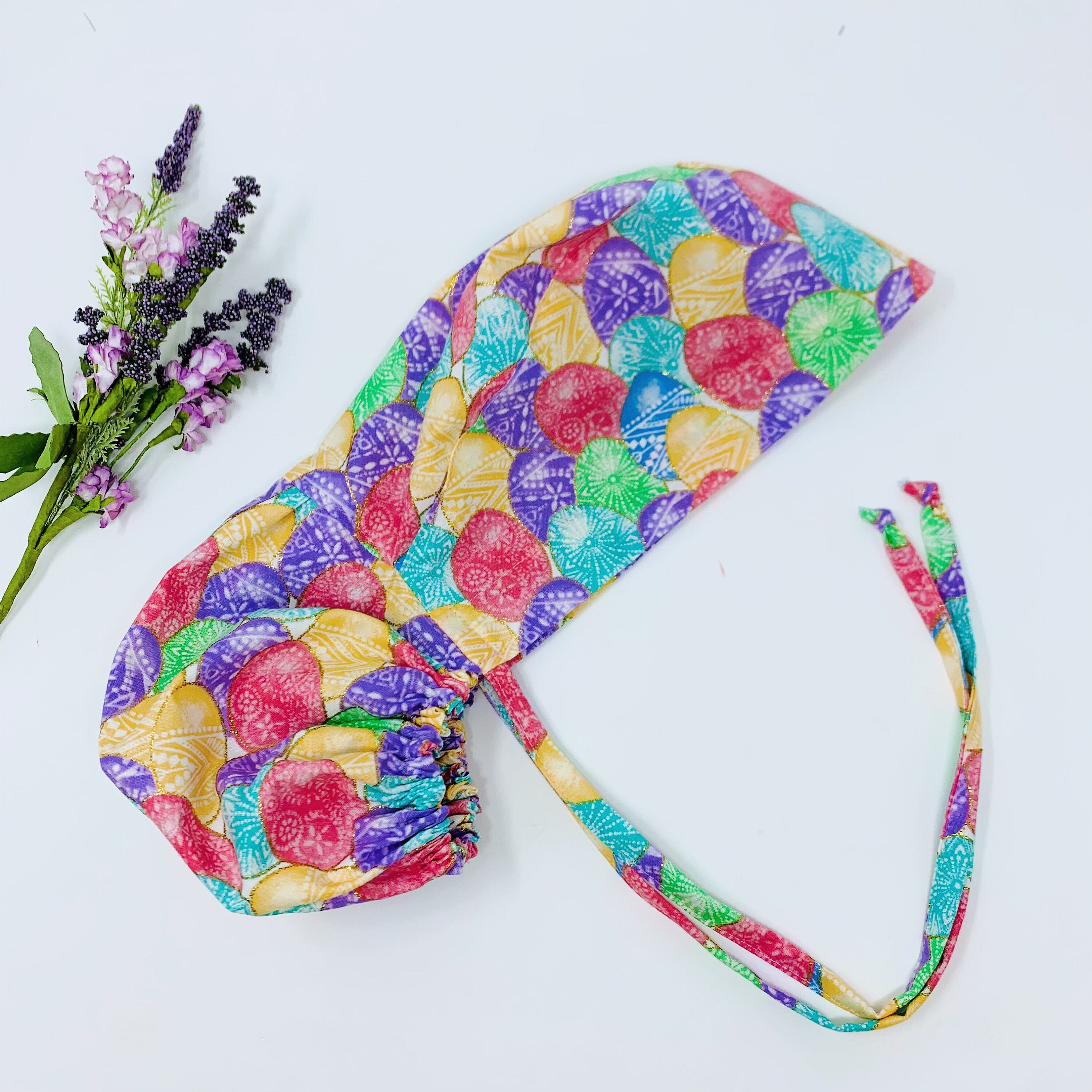 Easter Eggs Ponytail scrub cap for women with satin lined option by Paradise Caps.
