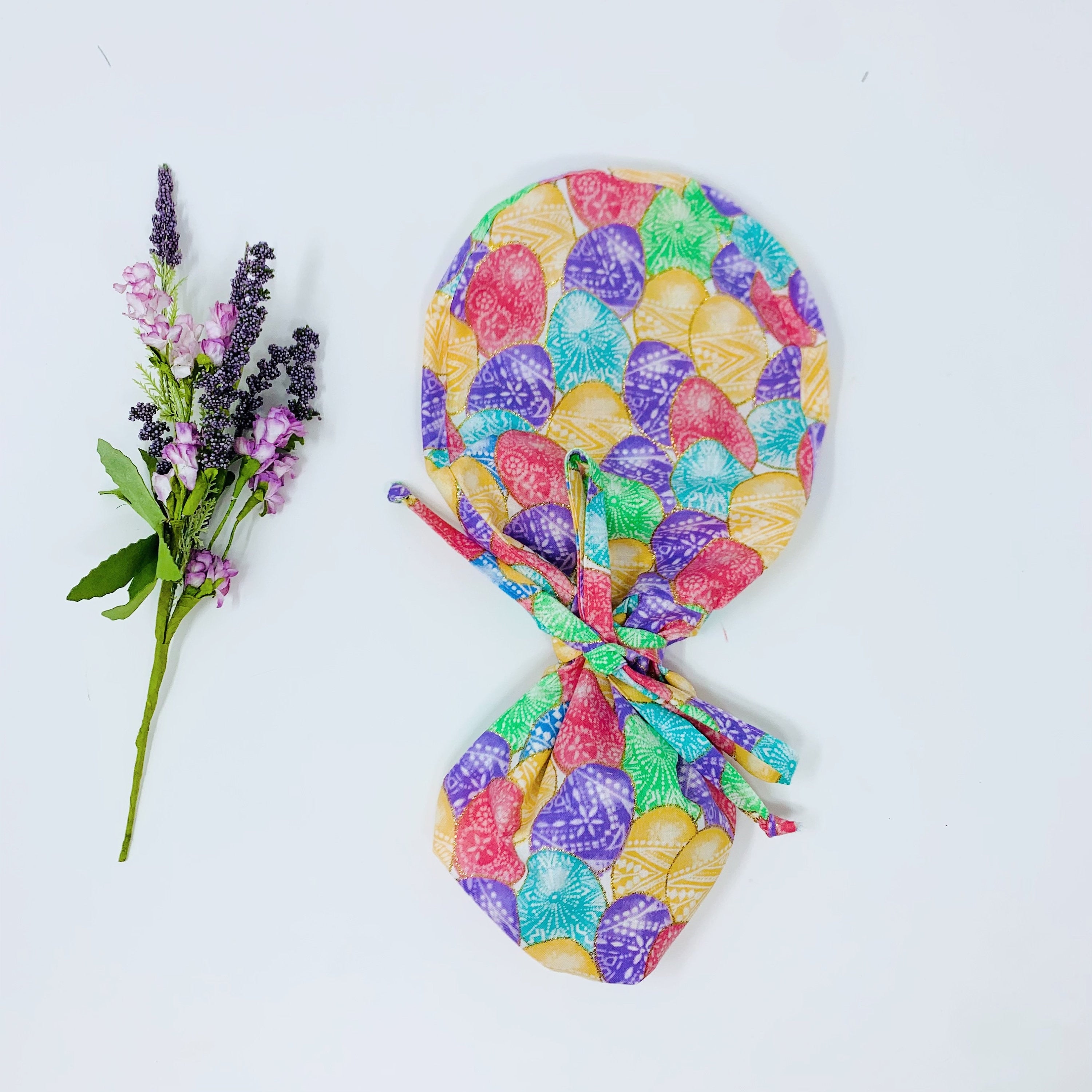 Easter Eggs Ponytail scrub cap for women with satin lined option by Paradise Caps.