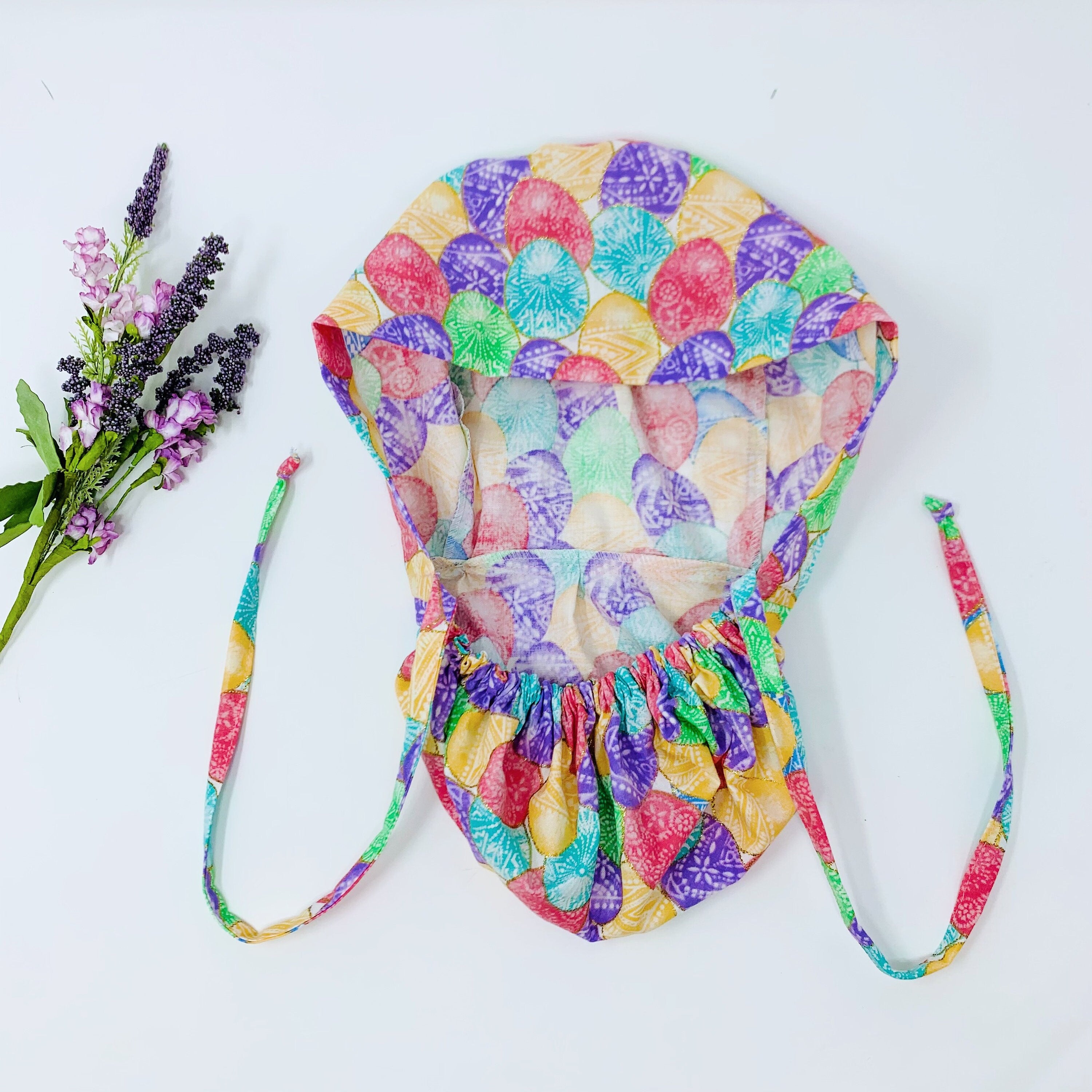 Easter Eggs Ponytail scrub cap for women with satin lined option by Paradise Caps.