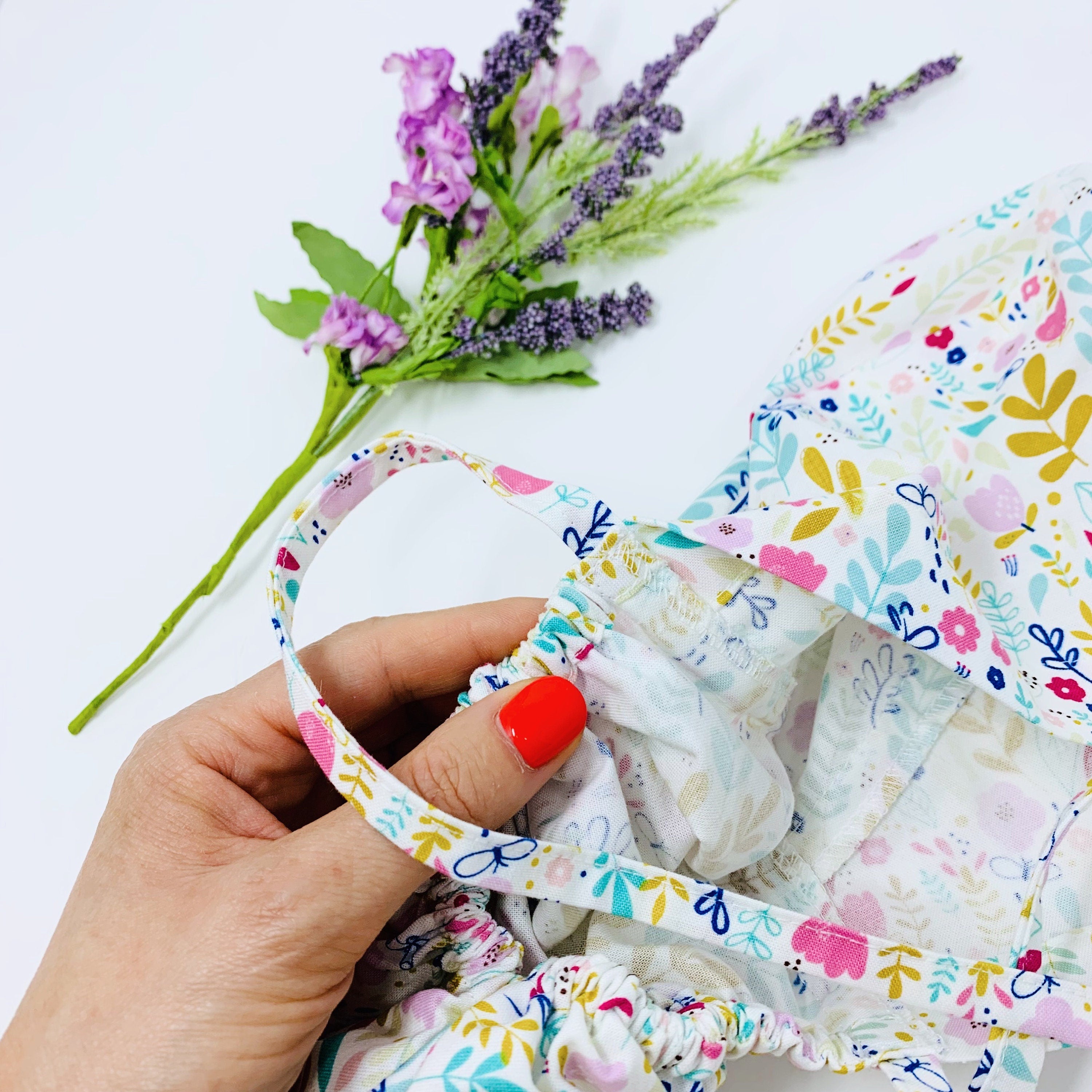 Flowers Ponytail scrub cap for women with satin lined option by Paradise Caps.