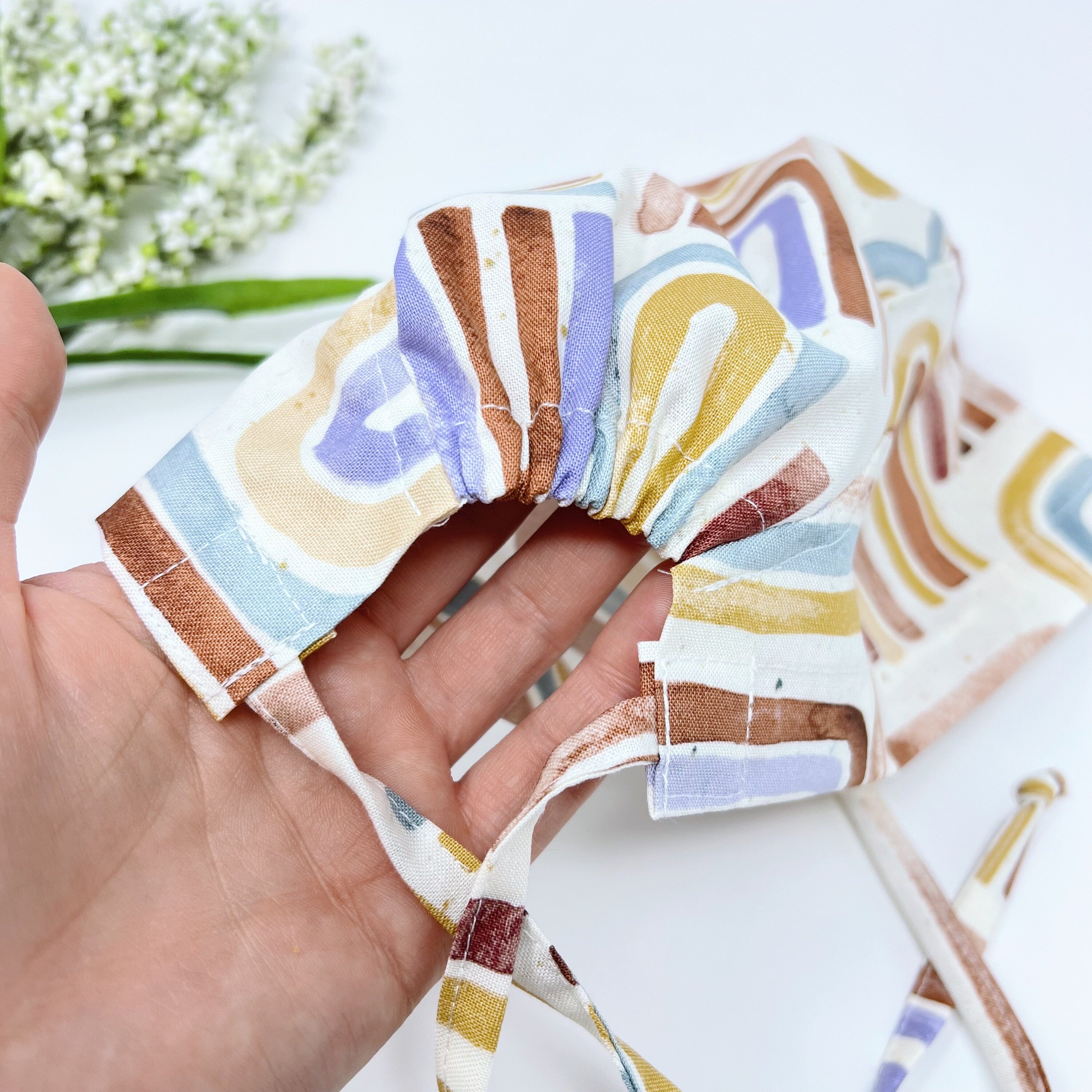 Rainbow Skull tie-back style surgical scrub cap for men by Paradise Caps.