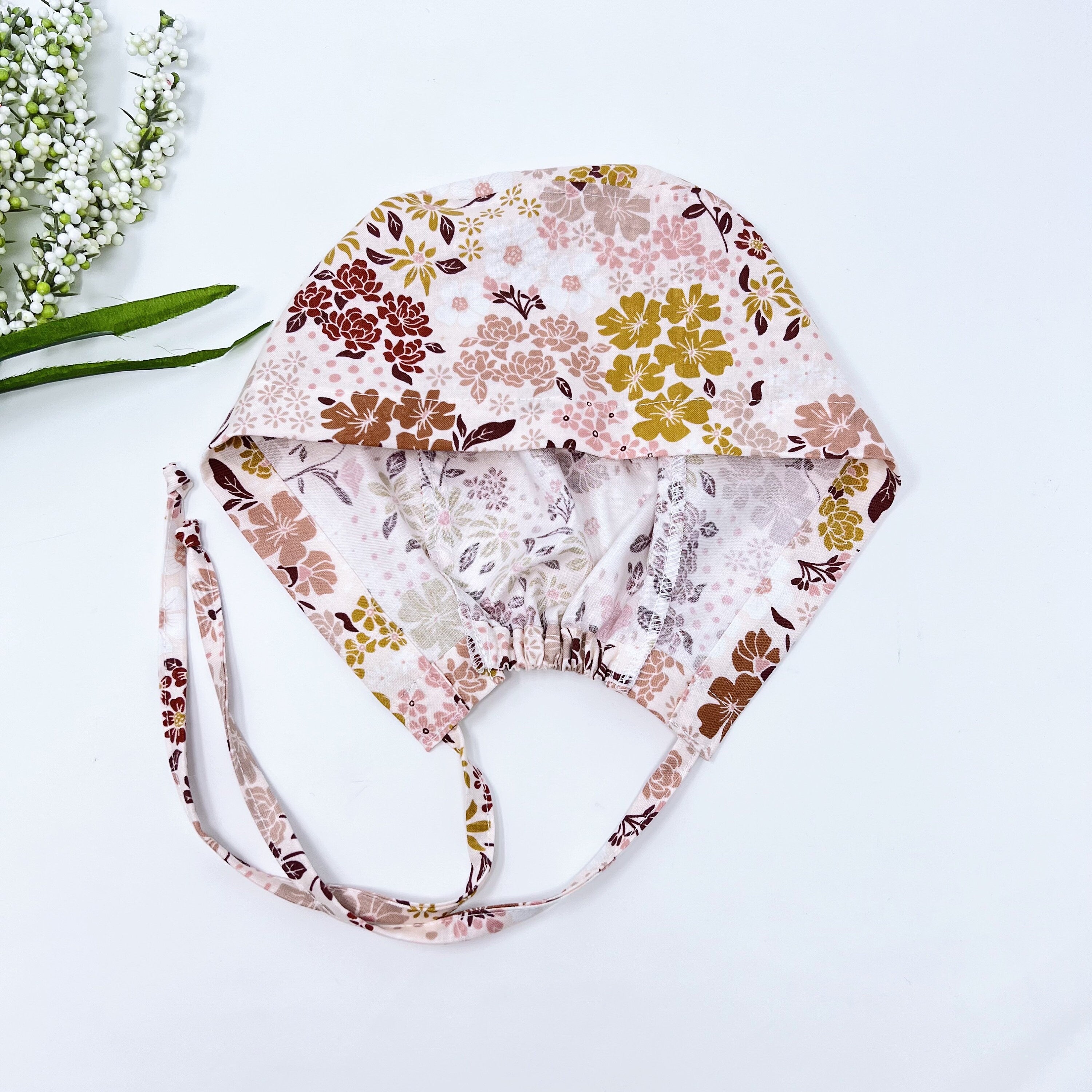 Floral Skull tie-back style surgical scrub cap for men by Paradise Caps.