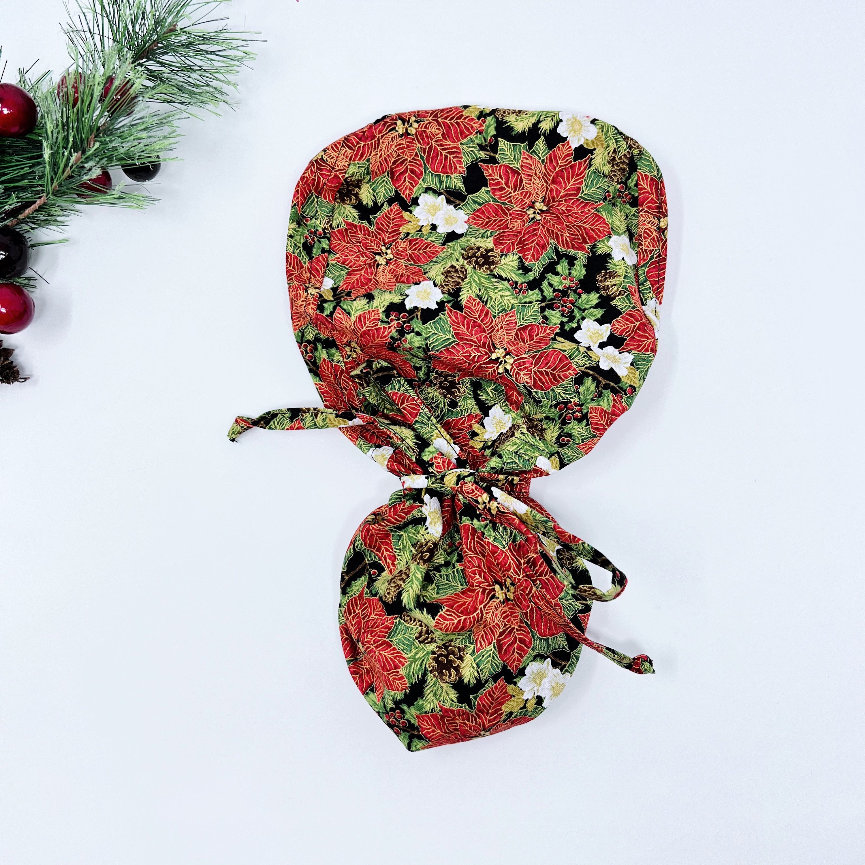 Red Gilded Poinsettias Ponytail scrub cap for women with satin lined option by Paradise Caps.