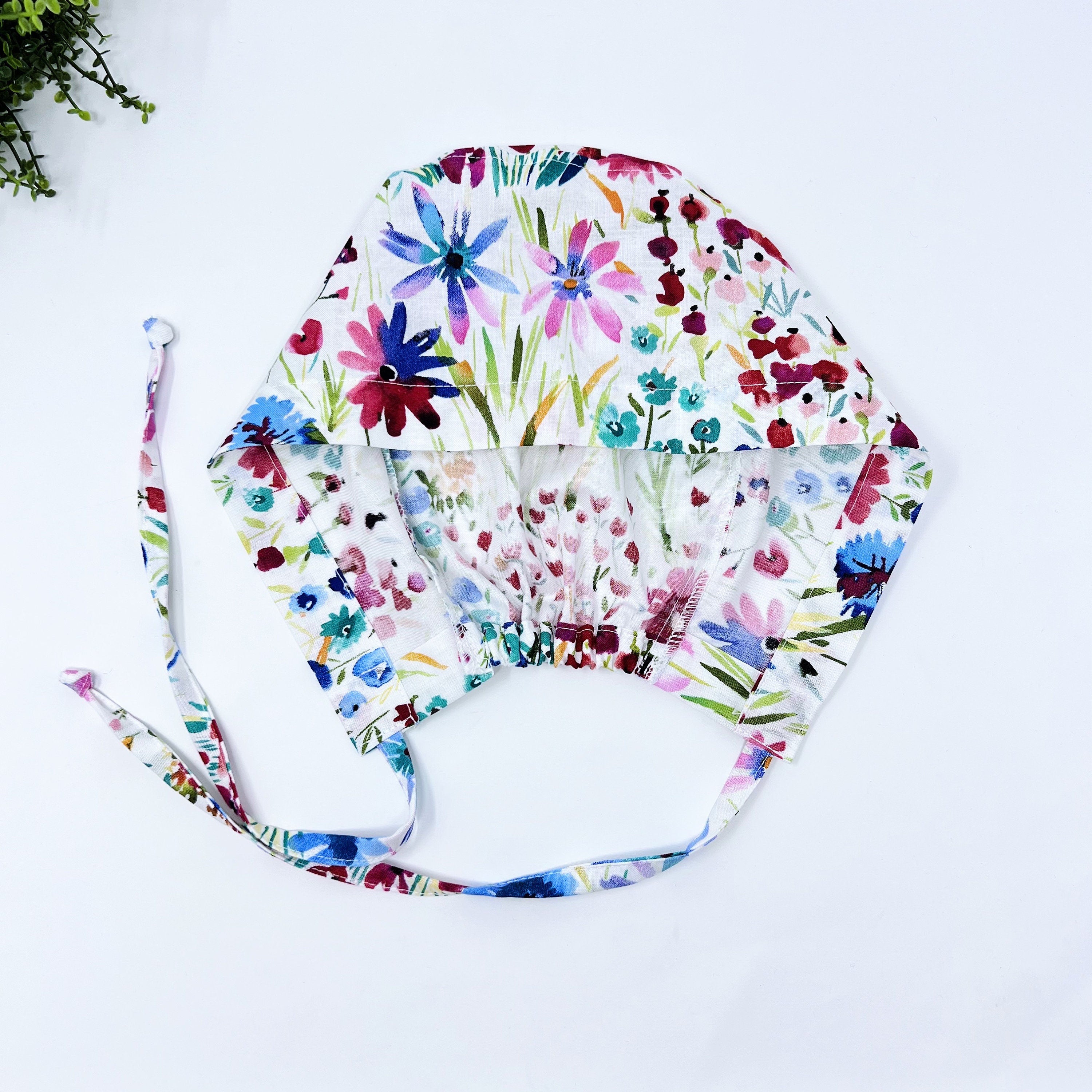 Red Flower Skull tie-back style surgical scrub cap for men by Paradise Caps.