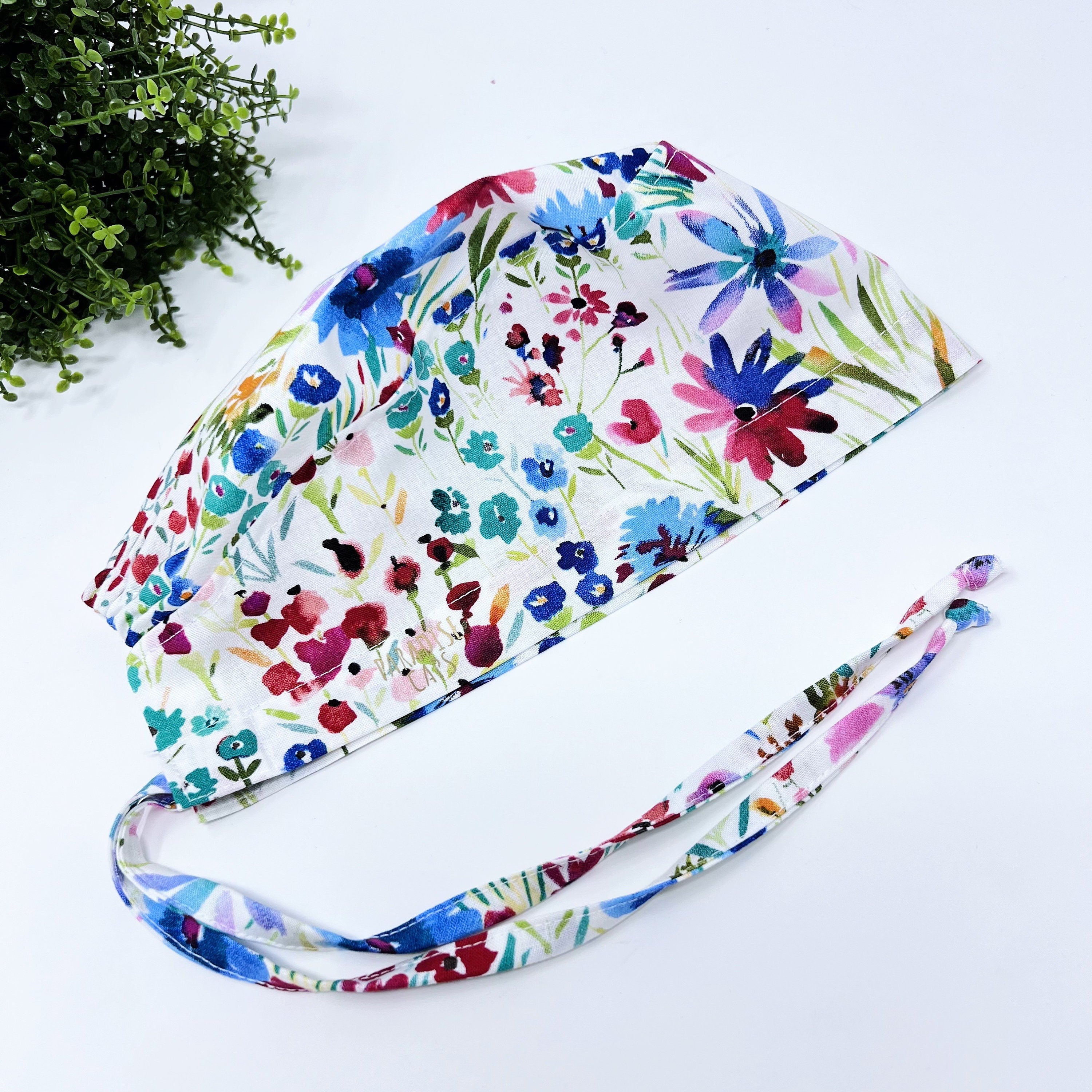 Red Flower Skull tie-back style surgical scrub cap for men by Paradise Caps.